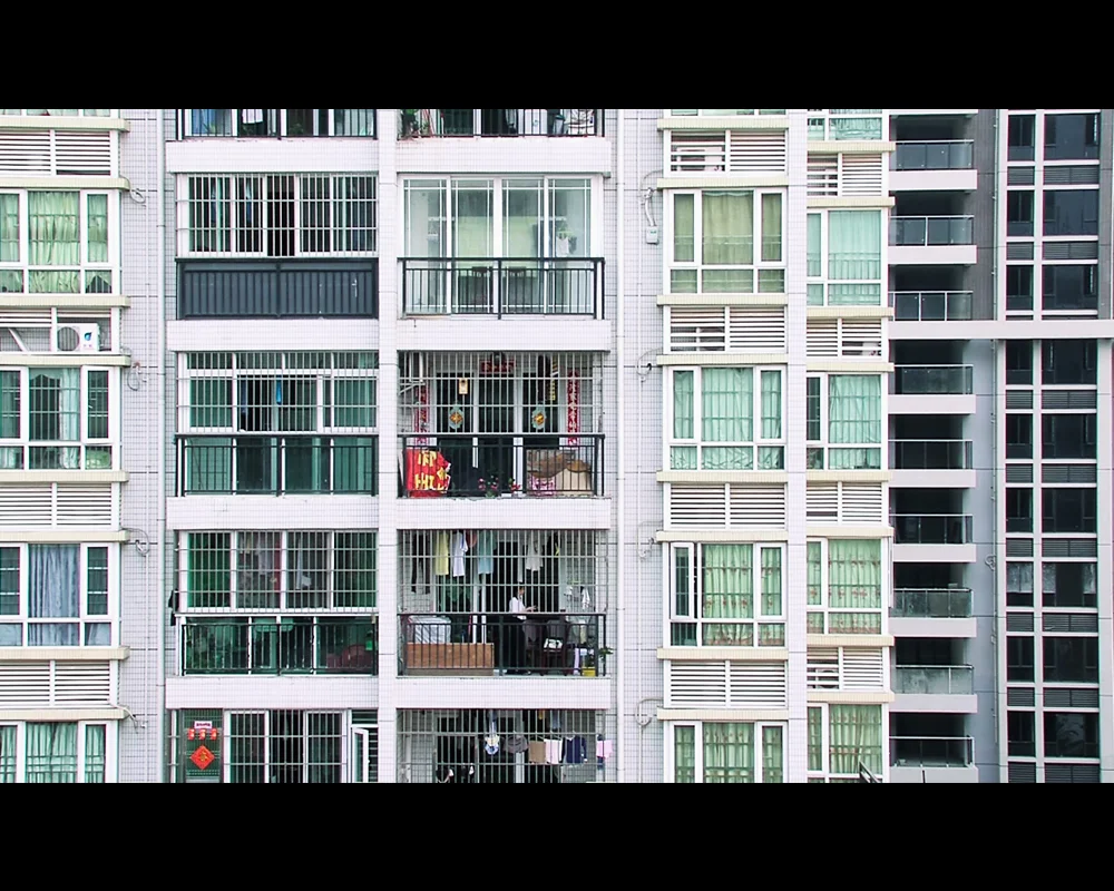 The Surroundings 2011 | China & Hong Kong | Short Fiction | 28 min | HD | Color | TRAILER Director/Scriptwriter/Cinematographer/Editor: Zhengfan Yang | Producer: Shengze Zhu Distributed by Hong Kong Art Development Council * Hong Kong Fresh Wave International Short Film Festival (Hong Kong, 2011) | Best Cinematography Award * China Independent Film Festival (China, 2012) | Top 10 Short Films of The Year * Cinetopia (Sweden, 2014) SYNOPSIS: In a society obsessed with economic development, the old and the young are often ignored. A young man from a rural area is hired to take care of an old man living on a farm. The old man stands firmly on keeping his home, while the young man works hard to make a life for him and his girlfriend. However, the two are met with the harshness of a society that's leaving them behind. In the end, they are surrounded by the crucial reality and become victims to a fate they did not choose.
