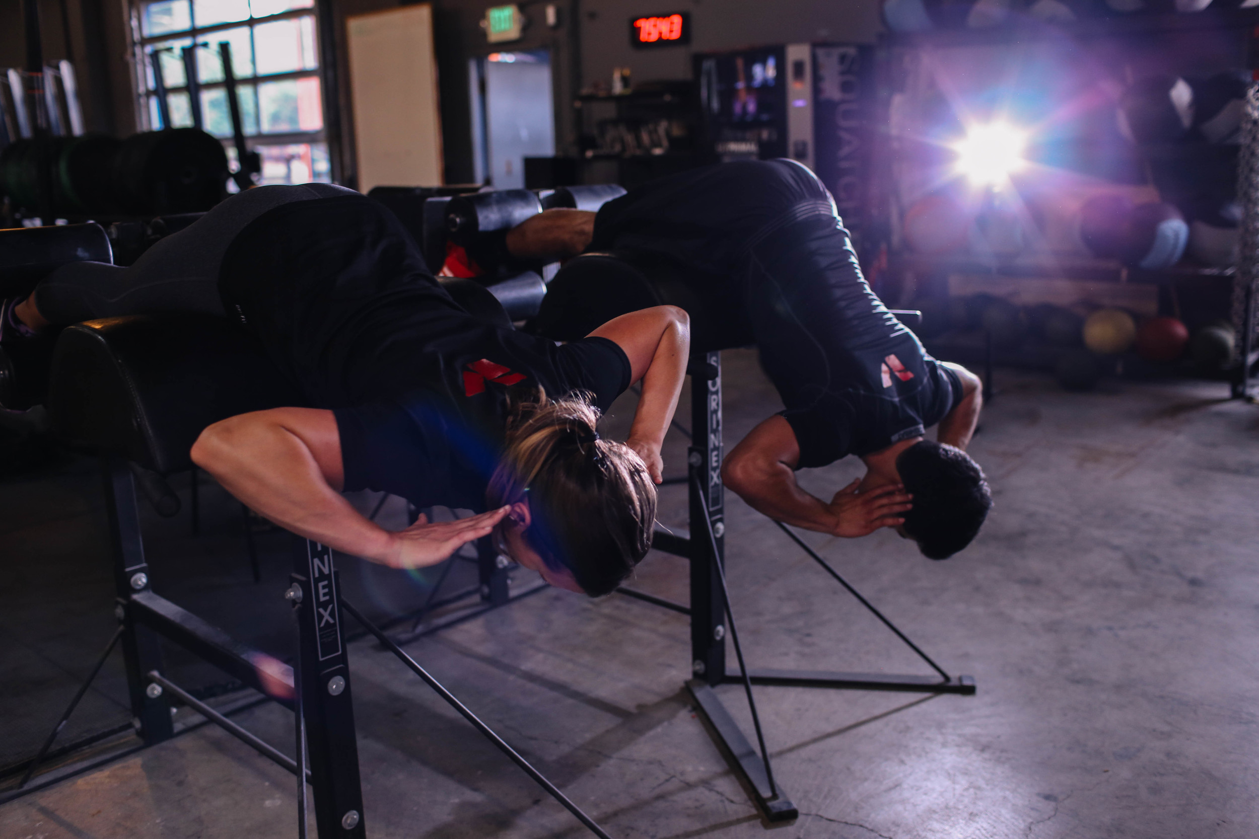 Increase the difficulty of the Glute-Ham Raise by pausing with the back parallel to the floor before rising onto the knees.