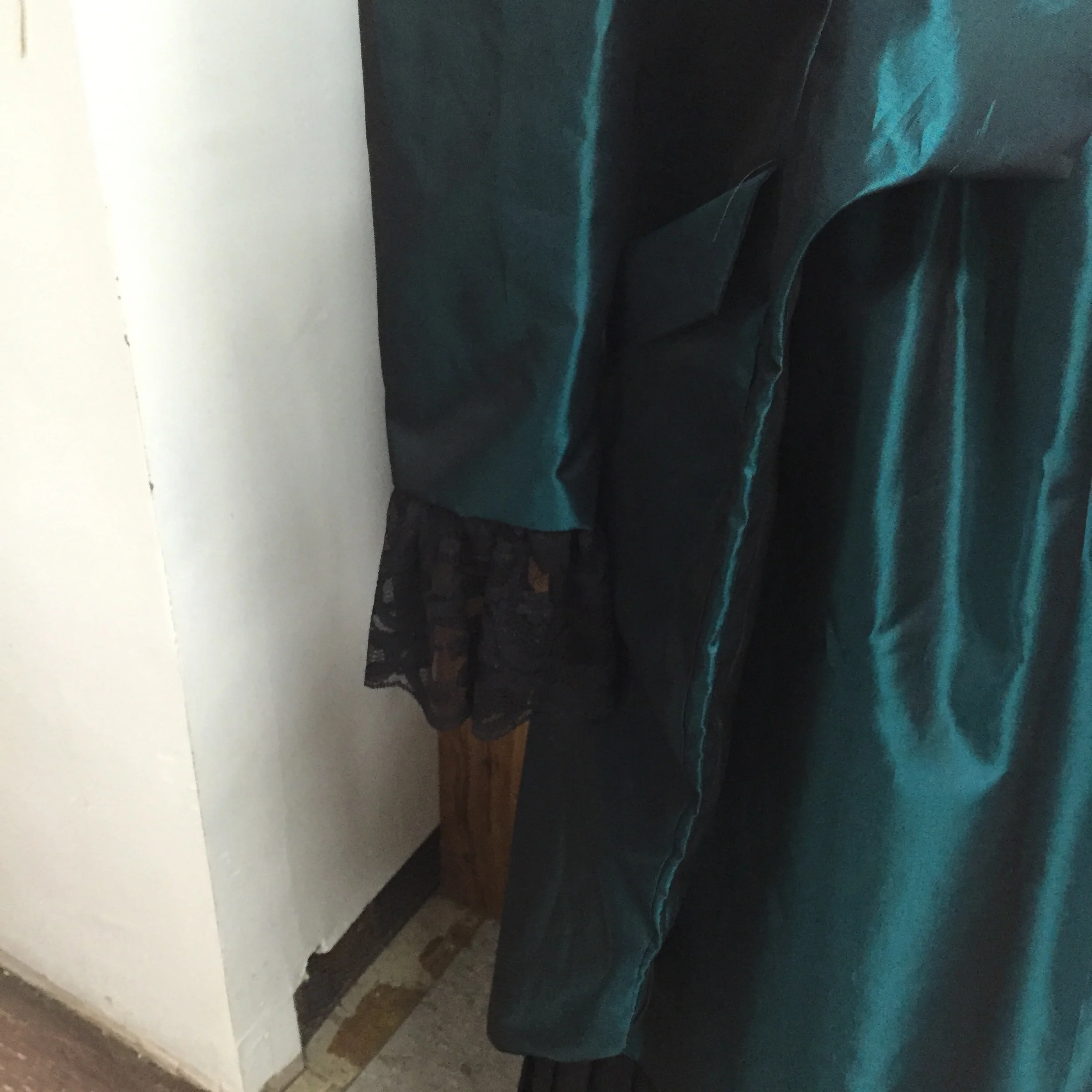 Jacket, sleeve and skirt close up.