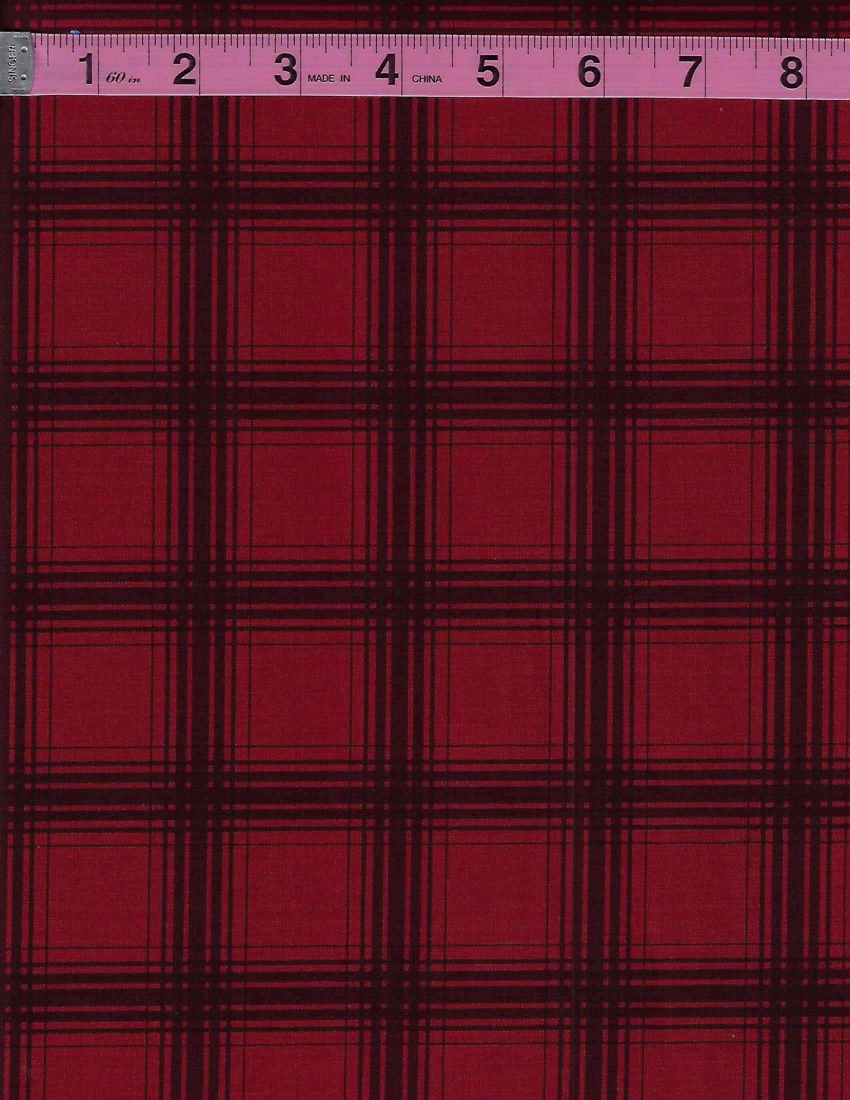 Farmhouse Christmas by Riley Blake Designs red cotton fabric featuring a classic black plaid pattern, coordinating with the sage green Christmas tree print.