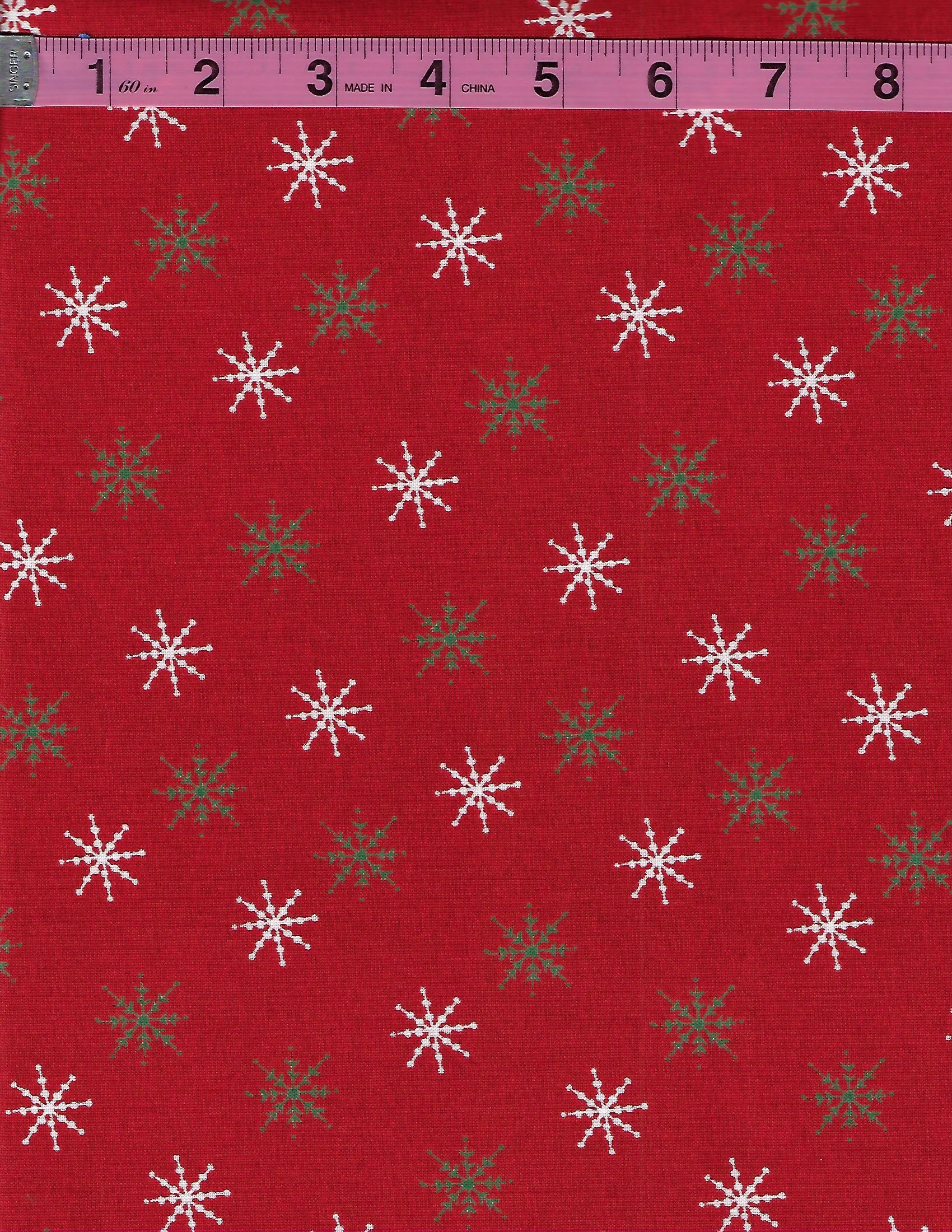 December Magic by Blank Quilting collection of four coordinating Christmas cotton fabrics featuring red and green ornaments, Christmas stockings, decorative holiday bells, and white and green snowflak