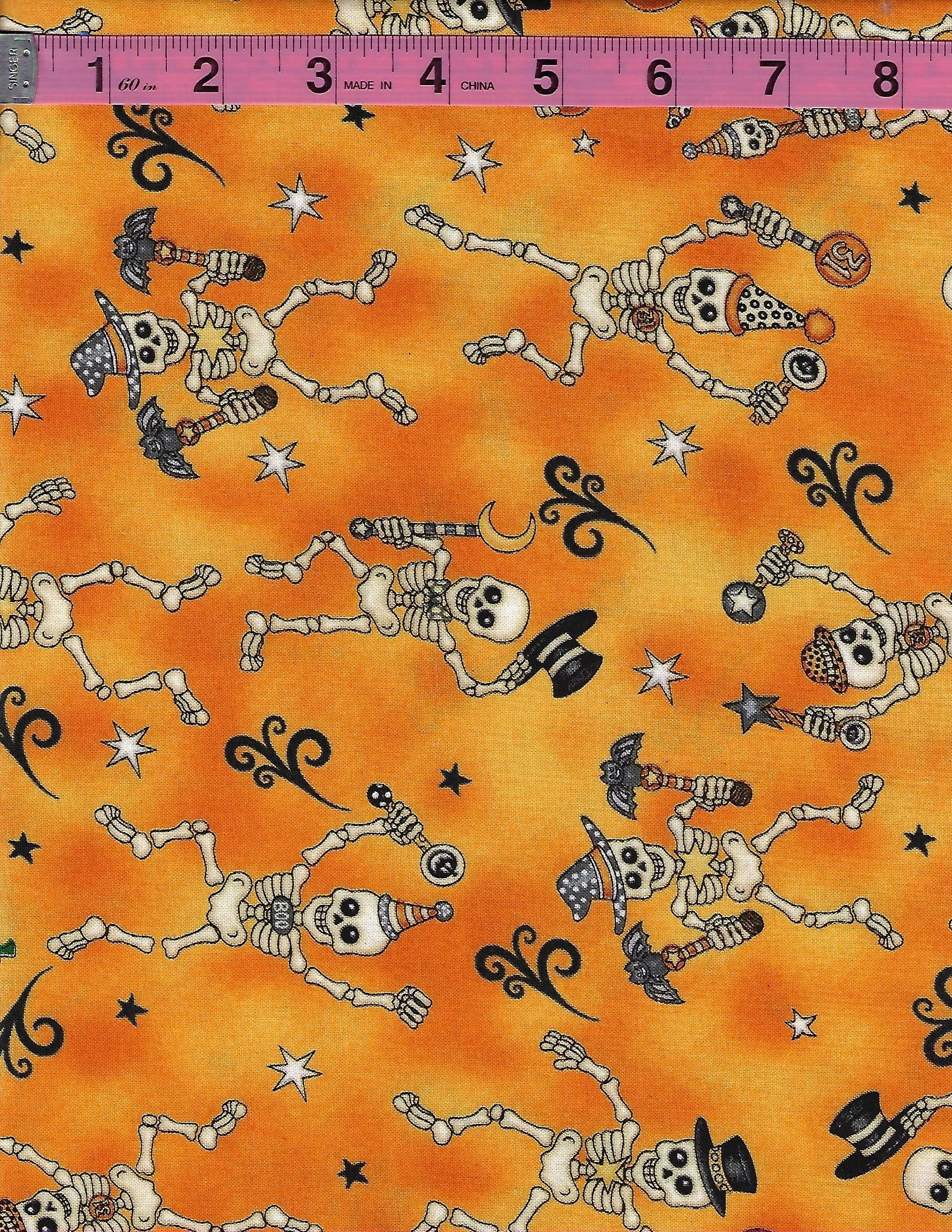 Quilting Treasures Creepy Hollow cotton fabric with Halloween skeletons, bats, stars and spooky motifs on orange background