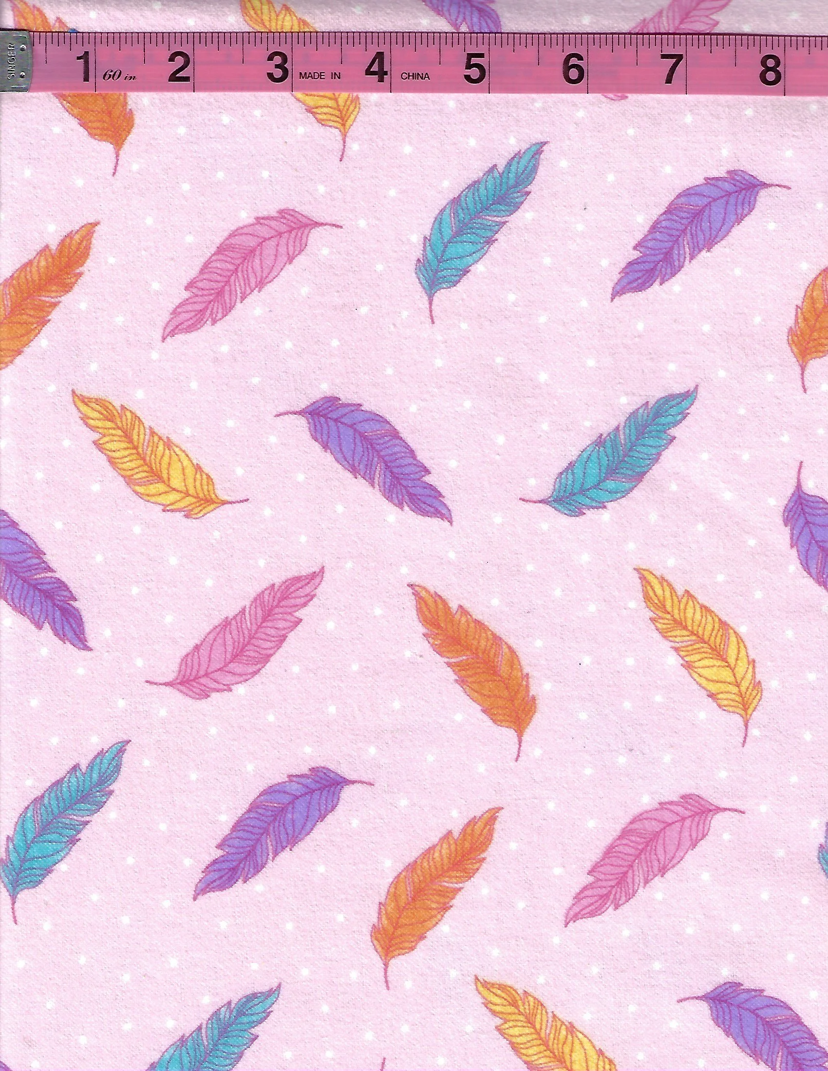 A.E. Nathan Comfy Prints flannel featuring colorful pink, purple, teal, and orange feathers scattered across a soft pink background with tiny white polka dots.