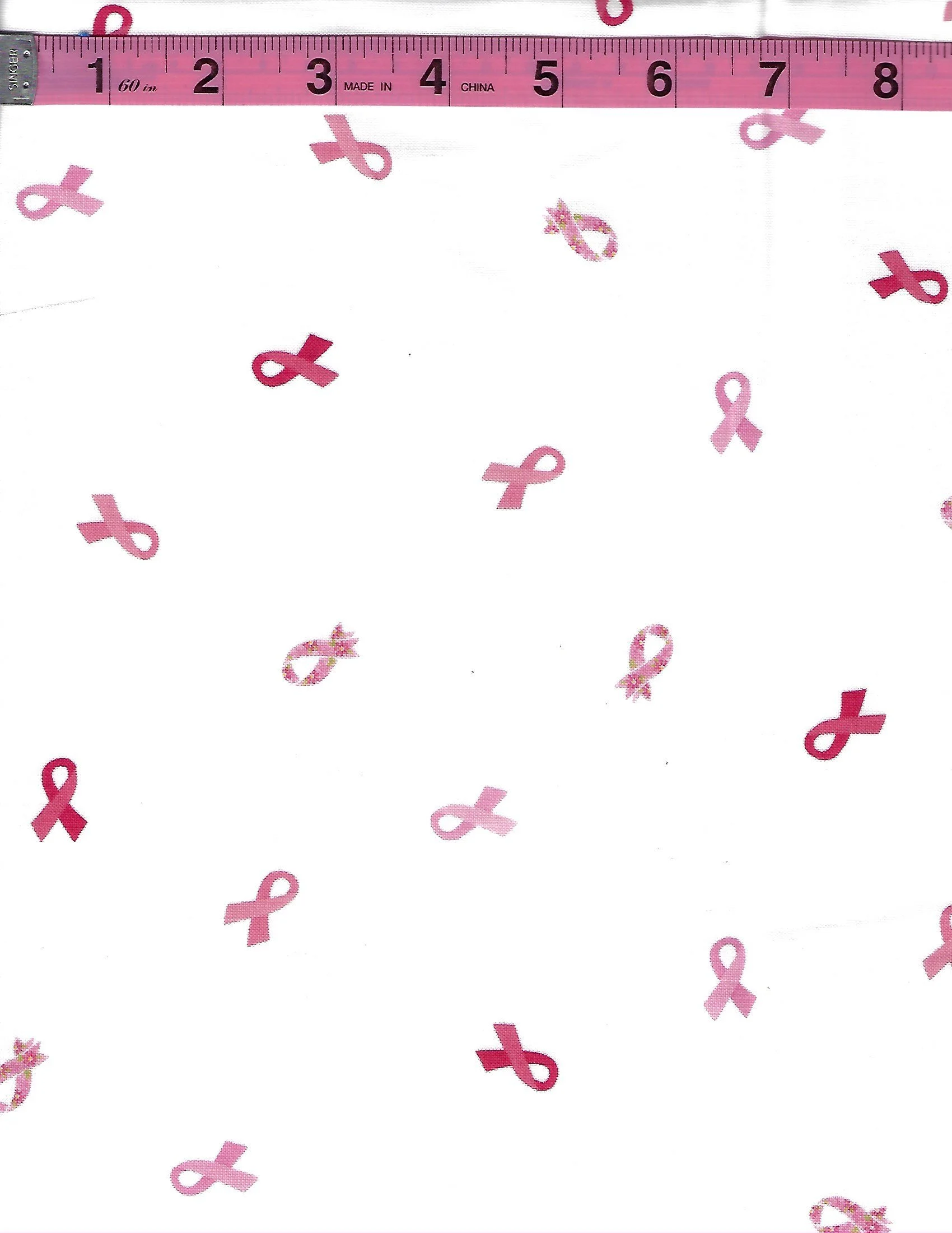 Riley Blake Designs Strength in Pink cotton fabric collection featuring pink ribbons, butterflies, floral designs, and coordinating pink prints.