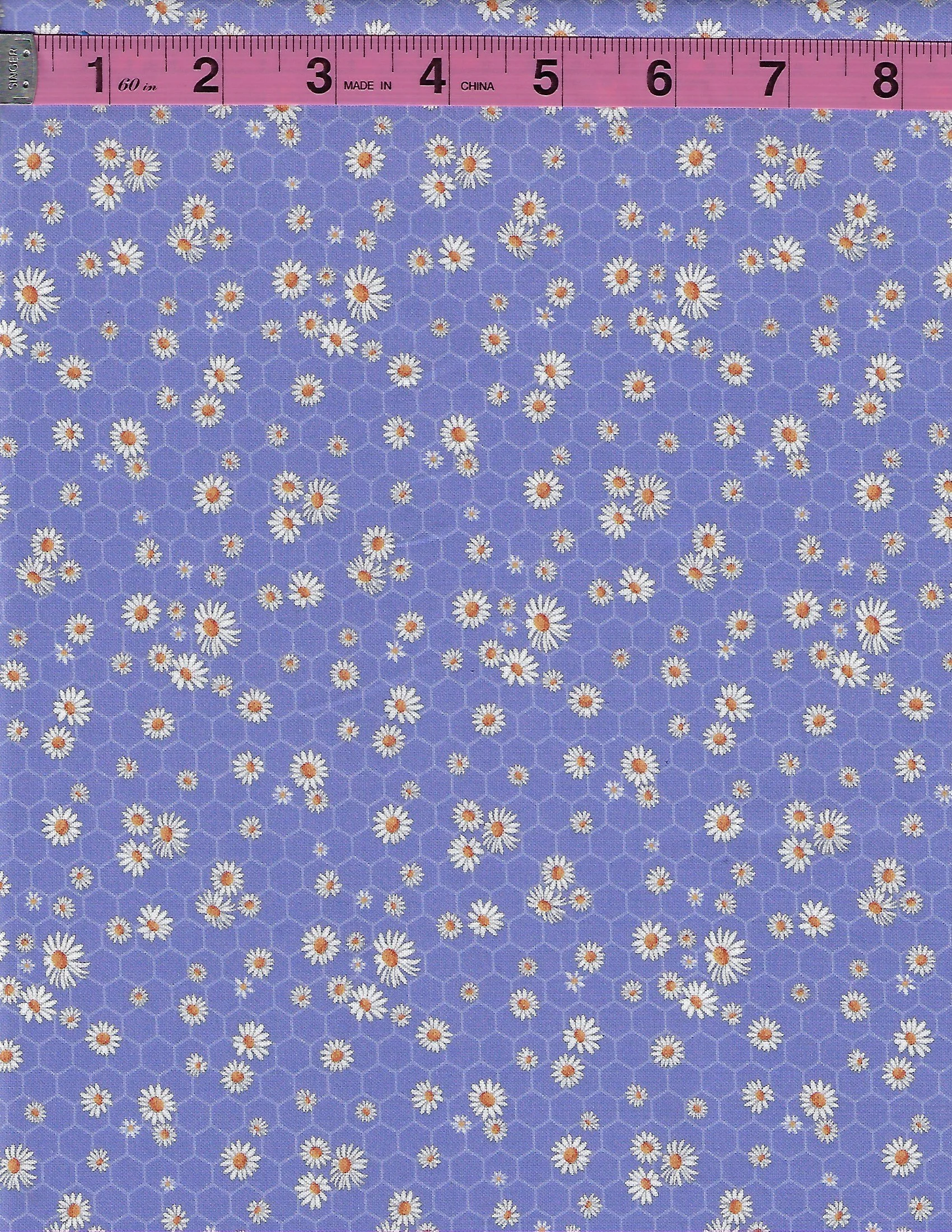100% cotton quilting fabric with scattered white daisies on a lavender honeycomb background, ideal for quilting, sewing and craft projects