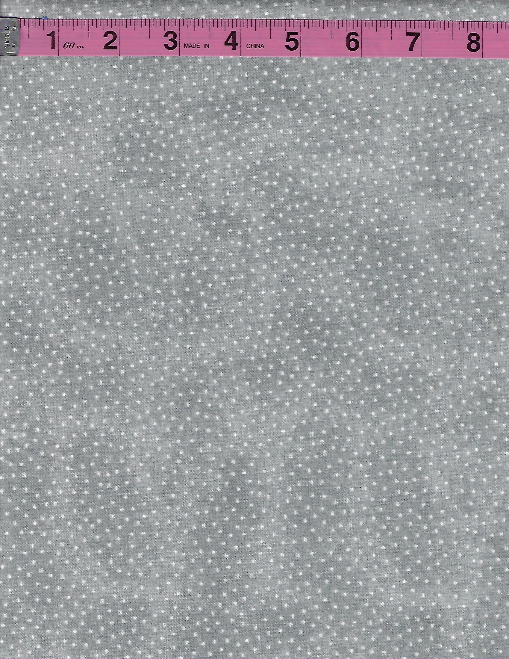 Gray 100% cotton flannel fabric with tiny white pin dot pattern