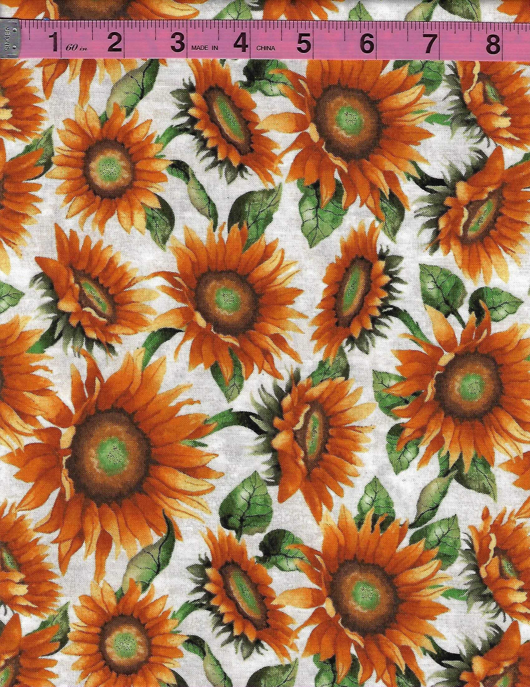 Collection of cotton fabrics featuring colorful corn cobs and bright orange sunflowers on light backgrounds