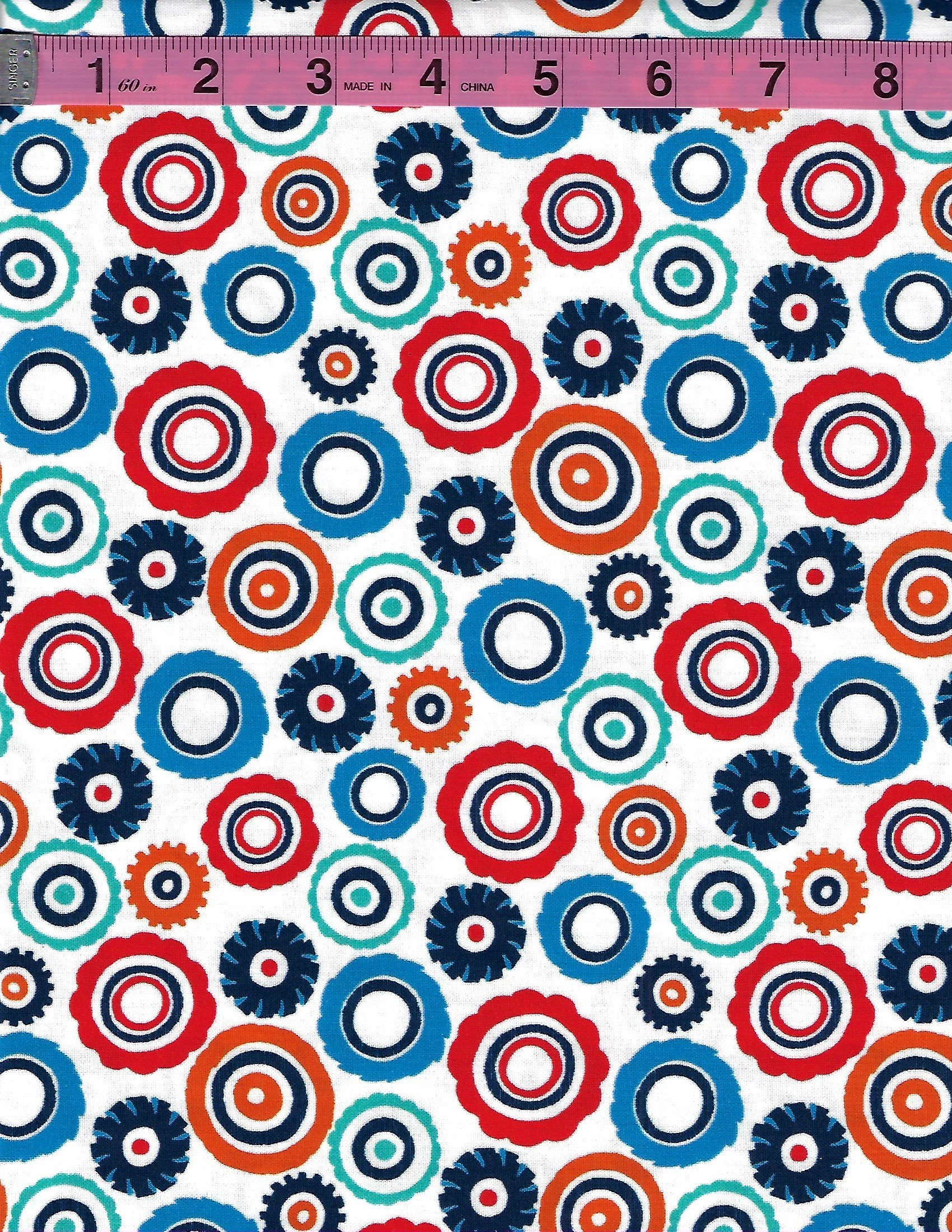 Michael Miller Monster Trucks cotton fabric collection featuring colorful monster trucks, wheels, racing sounds and bold red, blue, white, orange and teal designs