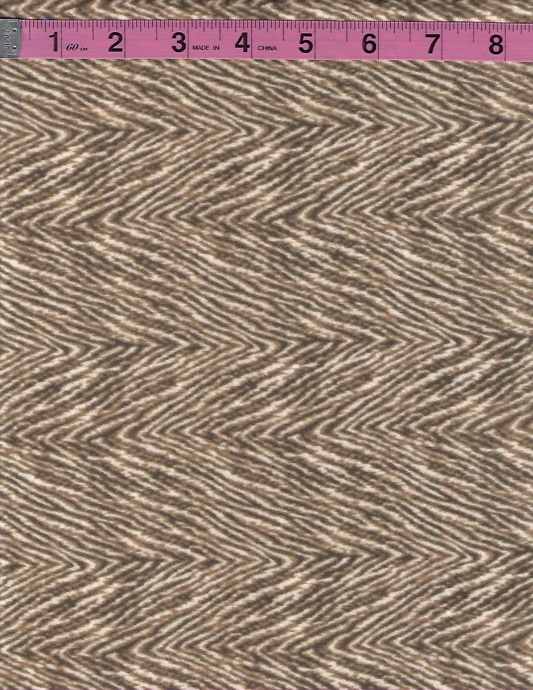 Timeless Treasures Tailor 100% cotton flannel fabric in a brown and tan chevron herringbone pattern.