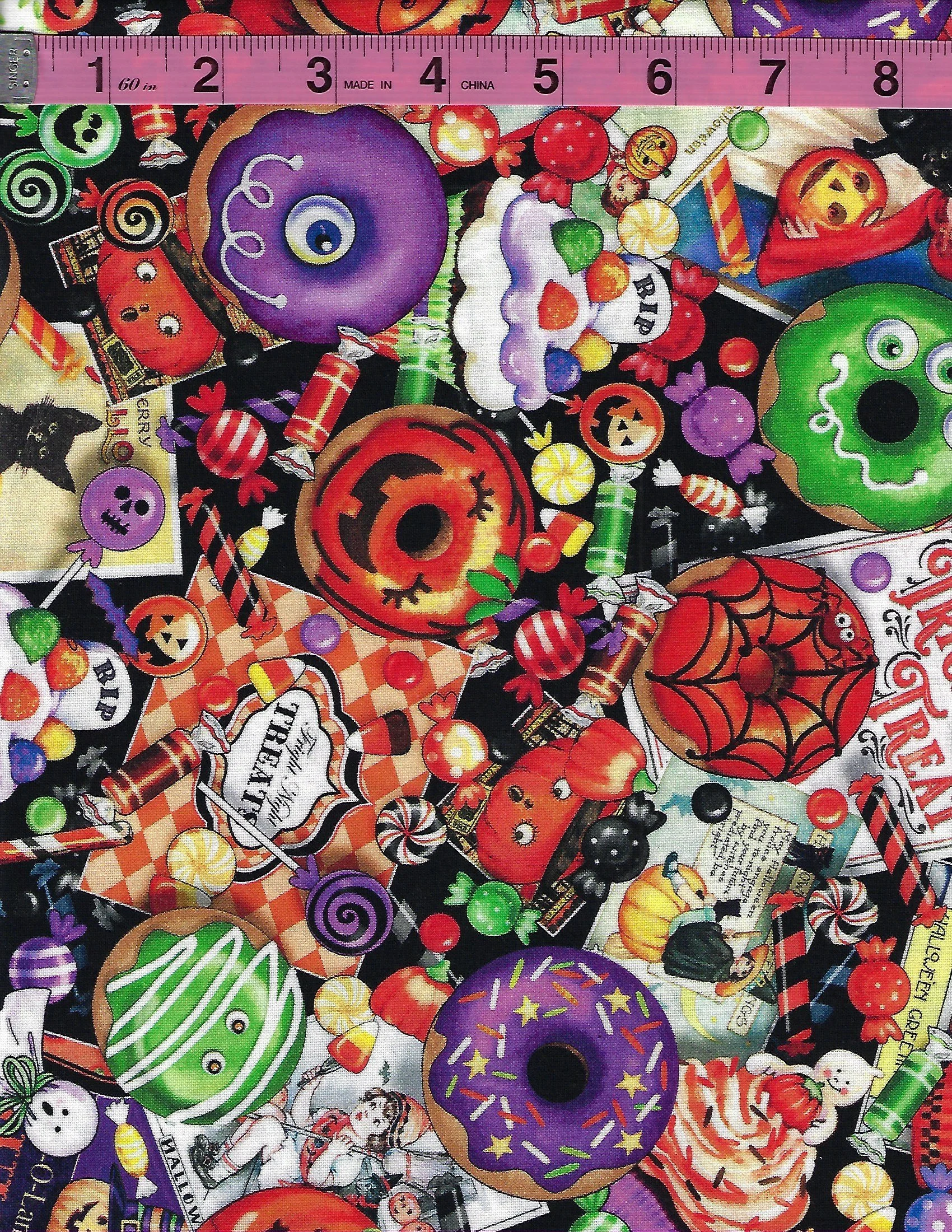 Quilting Treasures Tricks & Treats Halloween cotton fabric with colorful candy, pumpkins, donuts, monsters and Halloween treats
