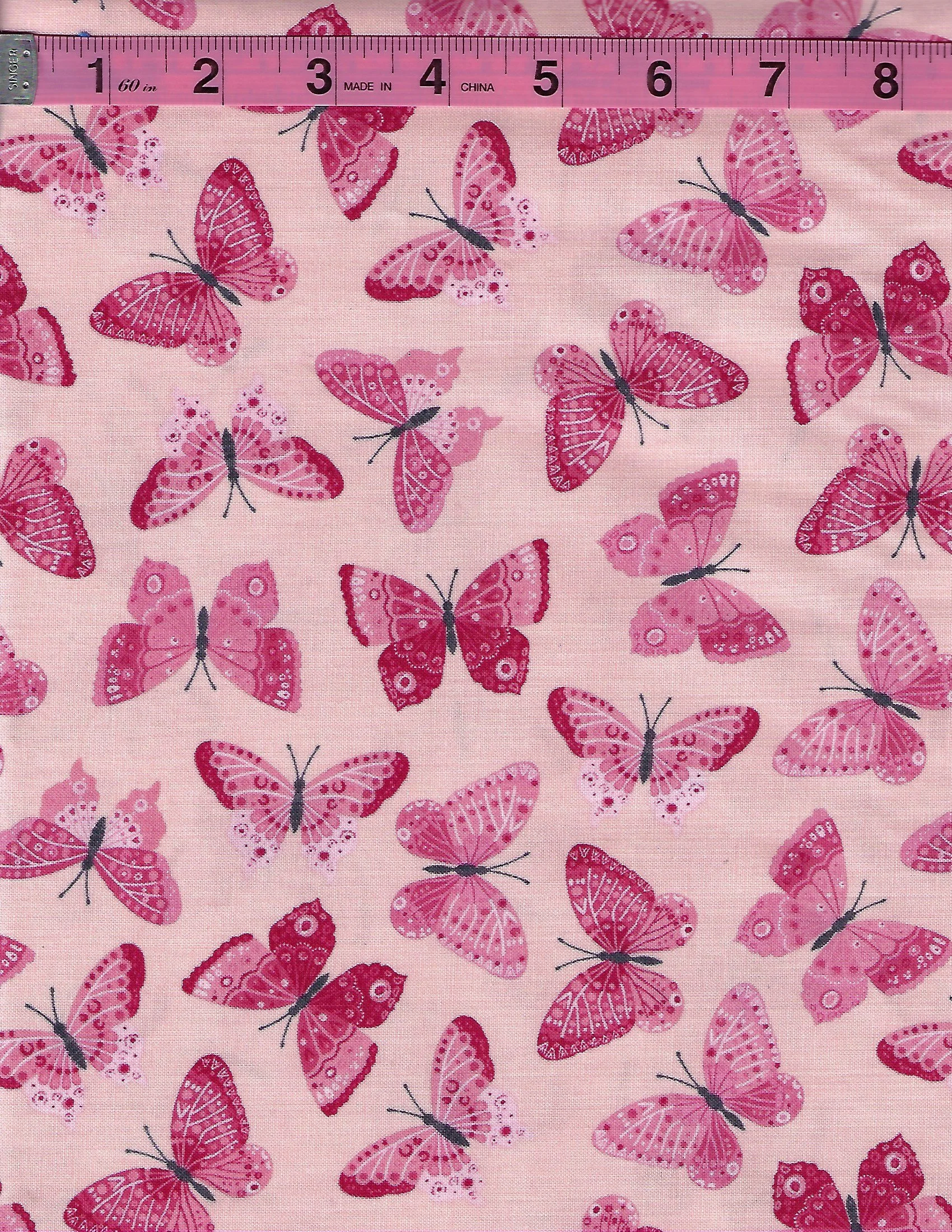 Riley Blake Designs Strength in Pink cotton fabric collection featuring pink ribbons, butterflies, floral designs, and coordinating pink prints.