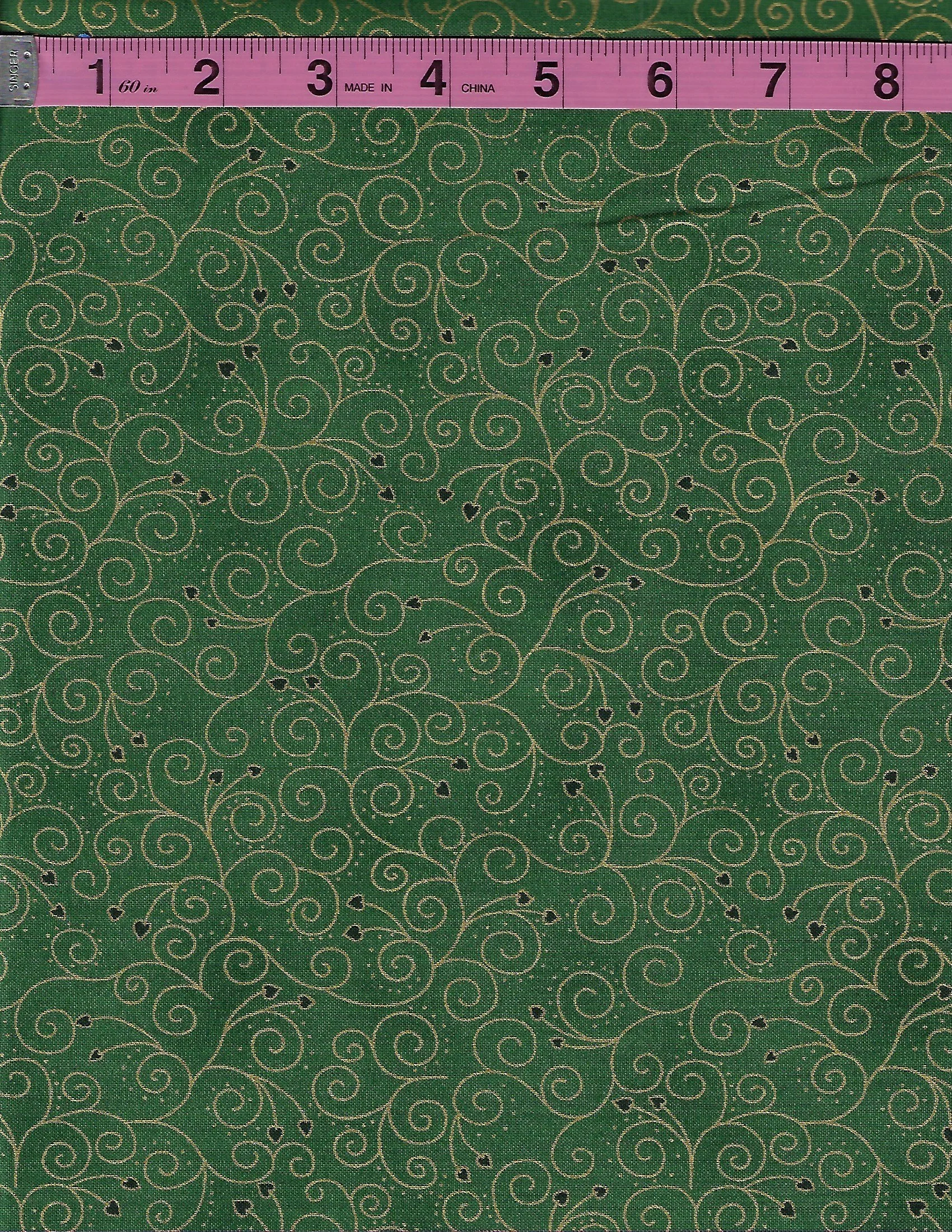 We Love Christmas by Blank Quilting coordinating cotton fabric pair featuring red holly berries and green leaves on a vintage cream background and gold swirling scrollwork on deep green fabric.