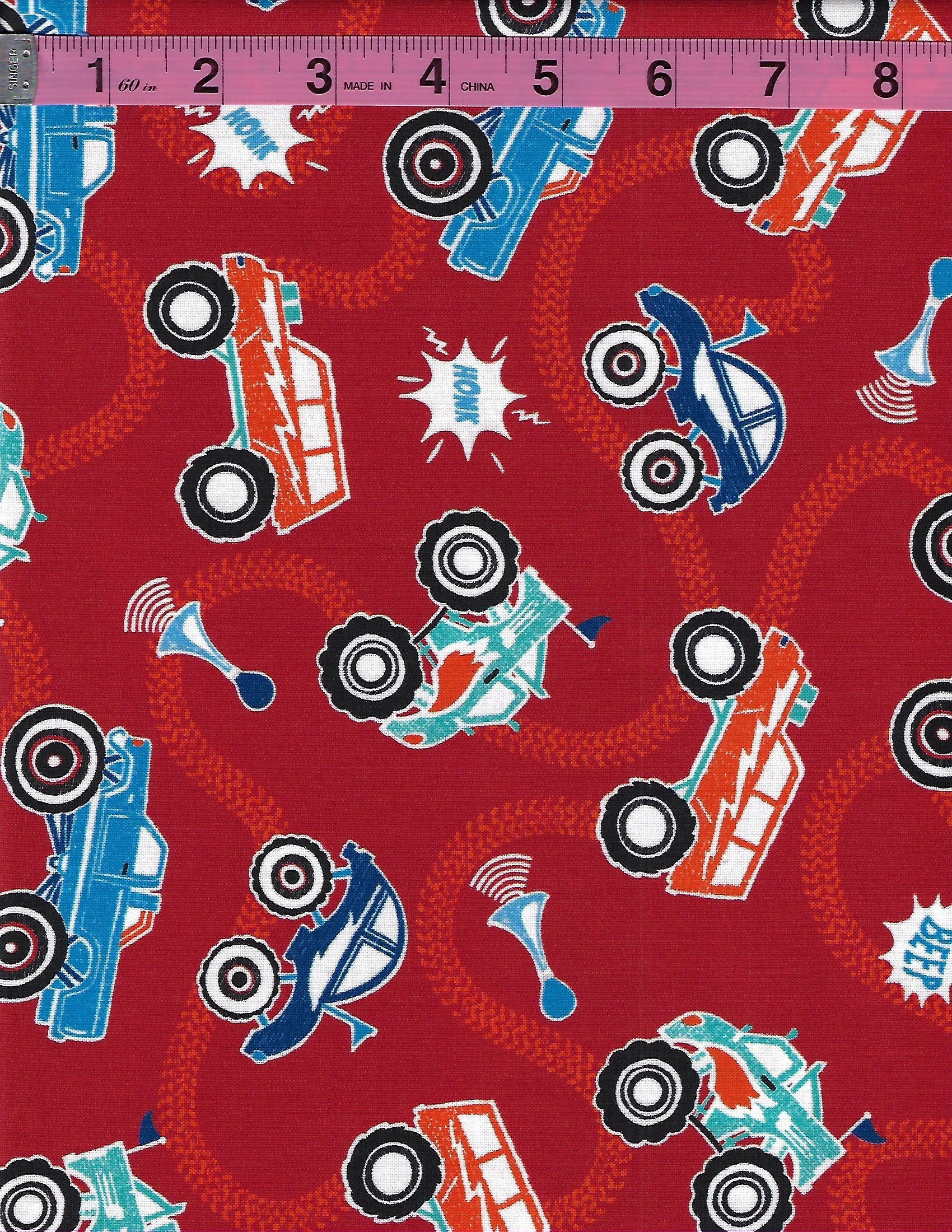 Michael Miller Monster Trucks cotton fabric collection featuring colorful monster trucks, wheels, racing sounds and bold red, blue, white, orange and teal designs