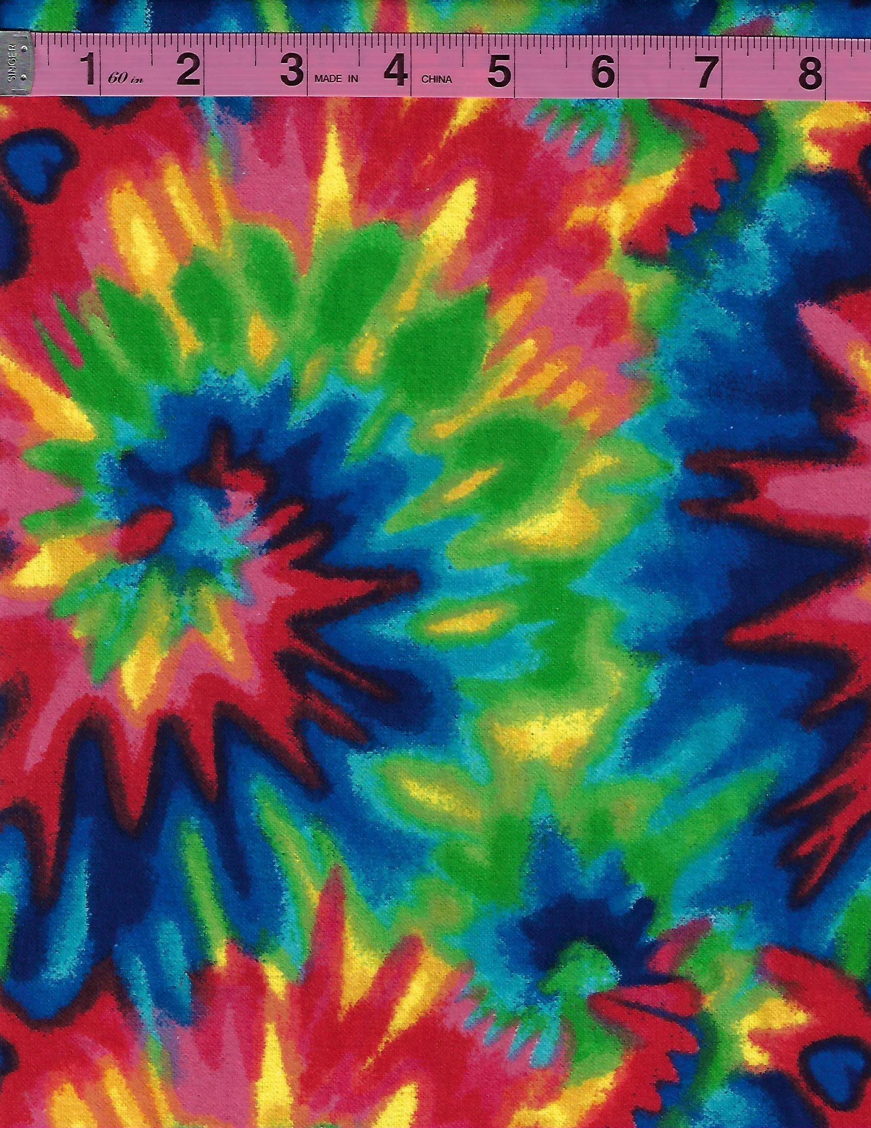 A. E. Nathan 100% cotton flannel Comfy Prints 0038 Col 78 featuring a vibrant tie-dye inspired pattern in blue, green, pink, red, yellow, and turquoise.