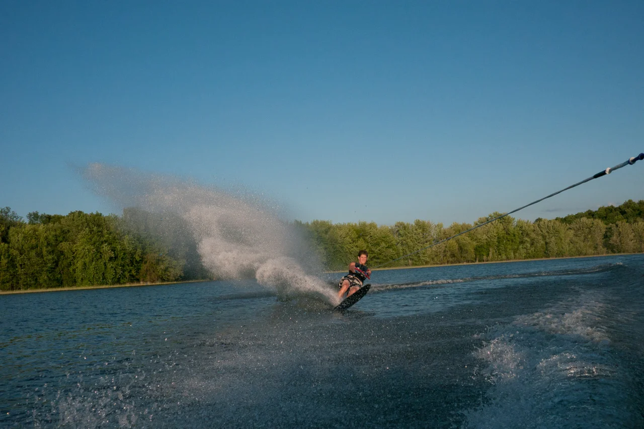 Caleb making a wave on the slalom ski