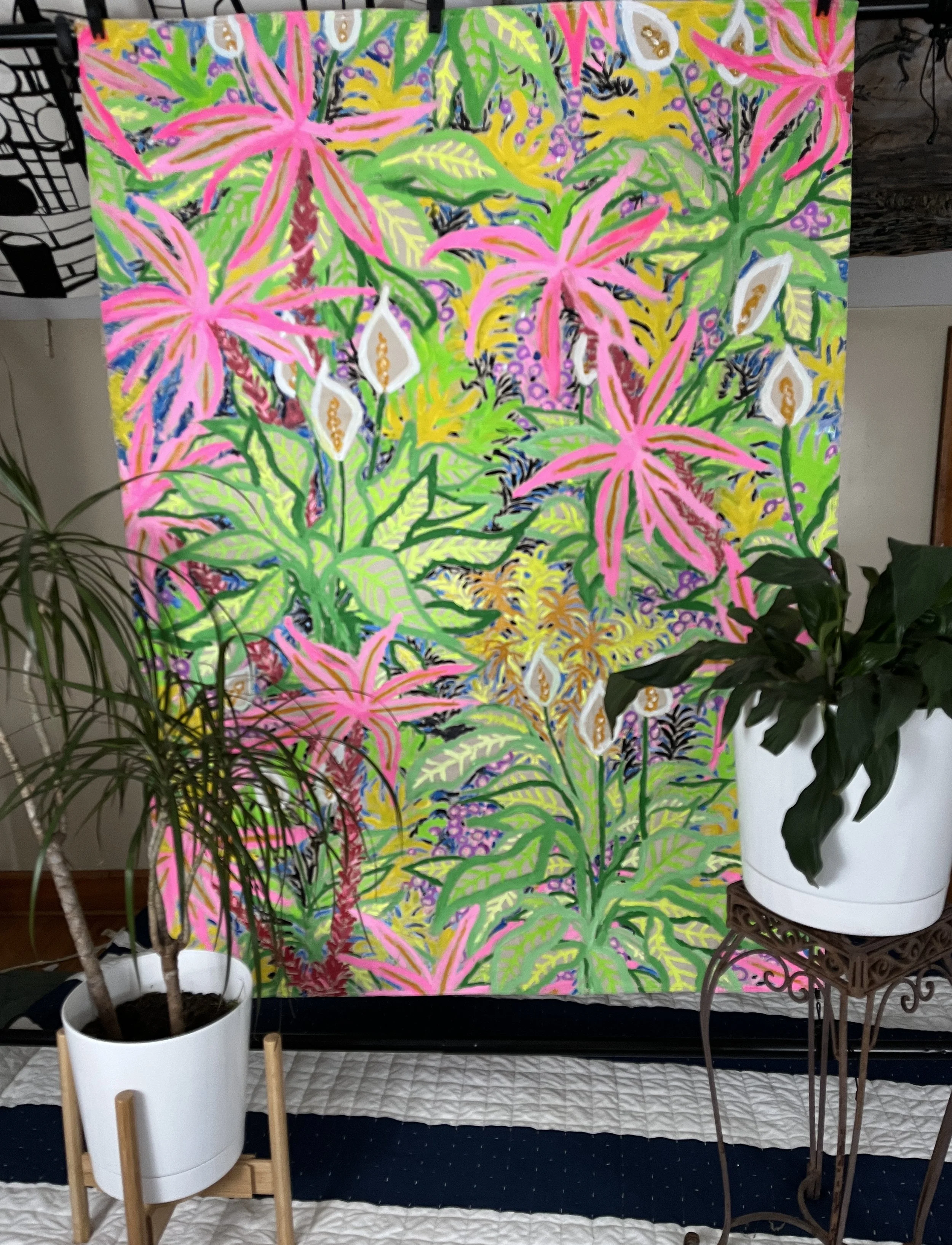 vibrant painting of plants on the wall in a room