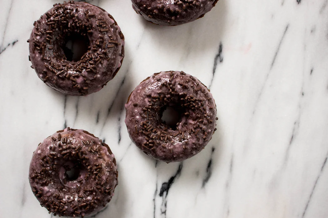 Chocolate Doughnuts with Blueberry Glaze