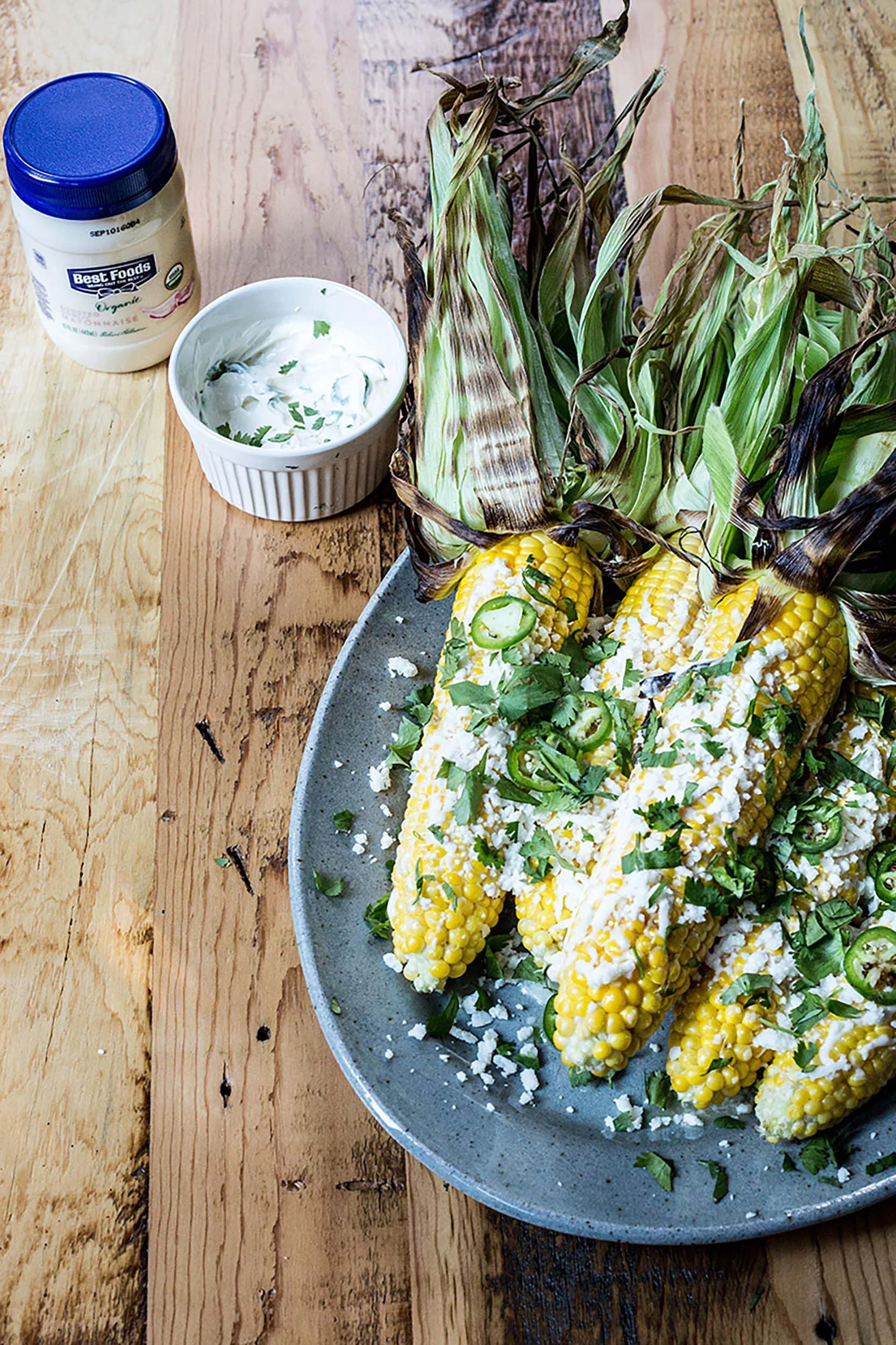 Elote with Organic Roasted Garlic Mayonnaise, Cotija, Jalapeños