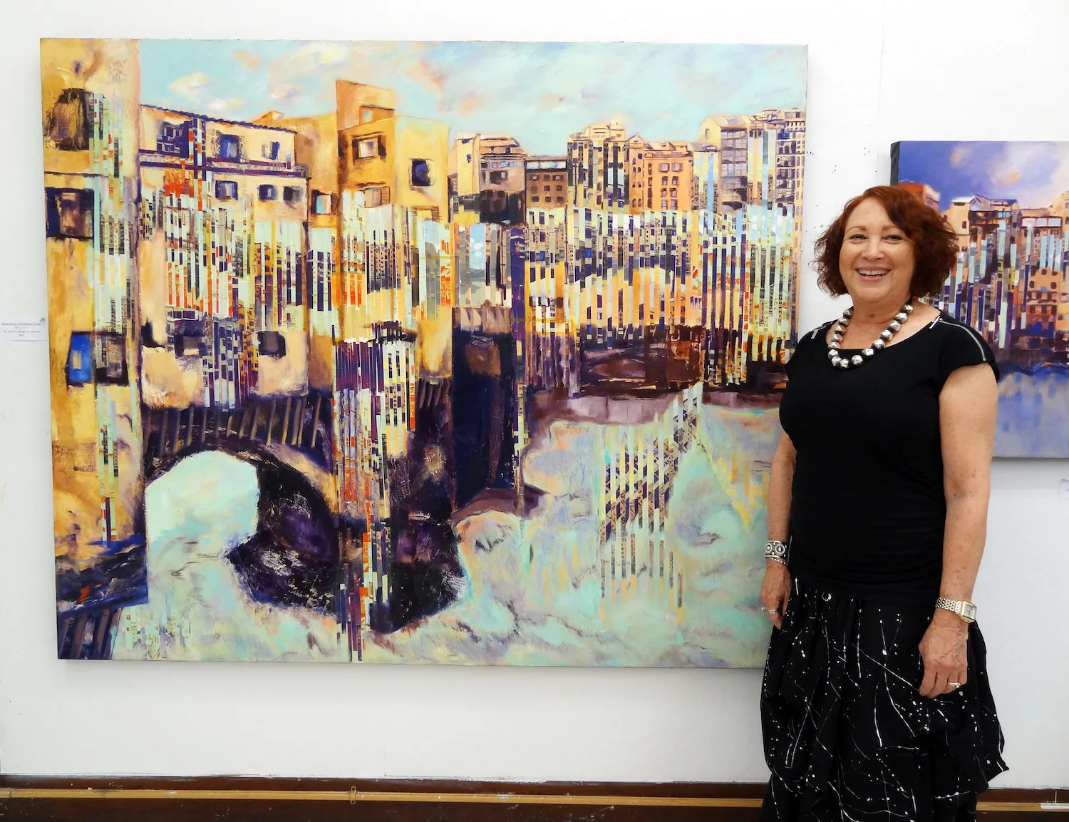 Artist Dee Cohen stands before her work, part of her 'Time In Oscillation' series, 2014.