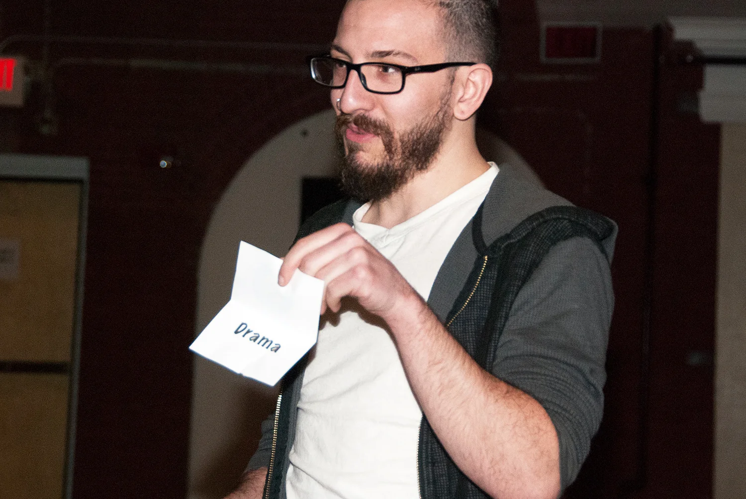 A 'Wicked Film Challenger' draws from a hat to determine the genre of his team's film.