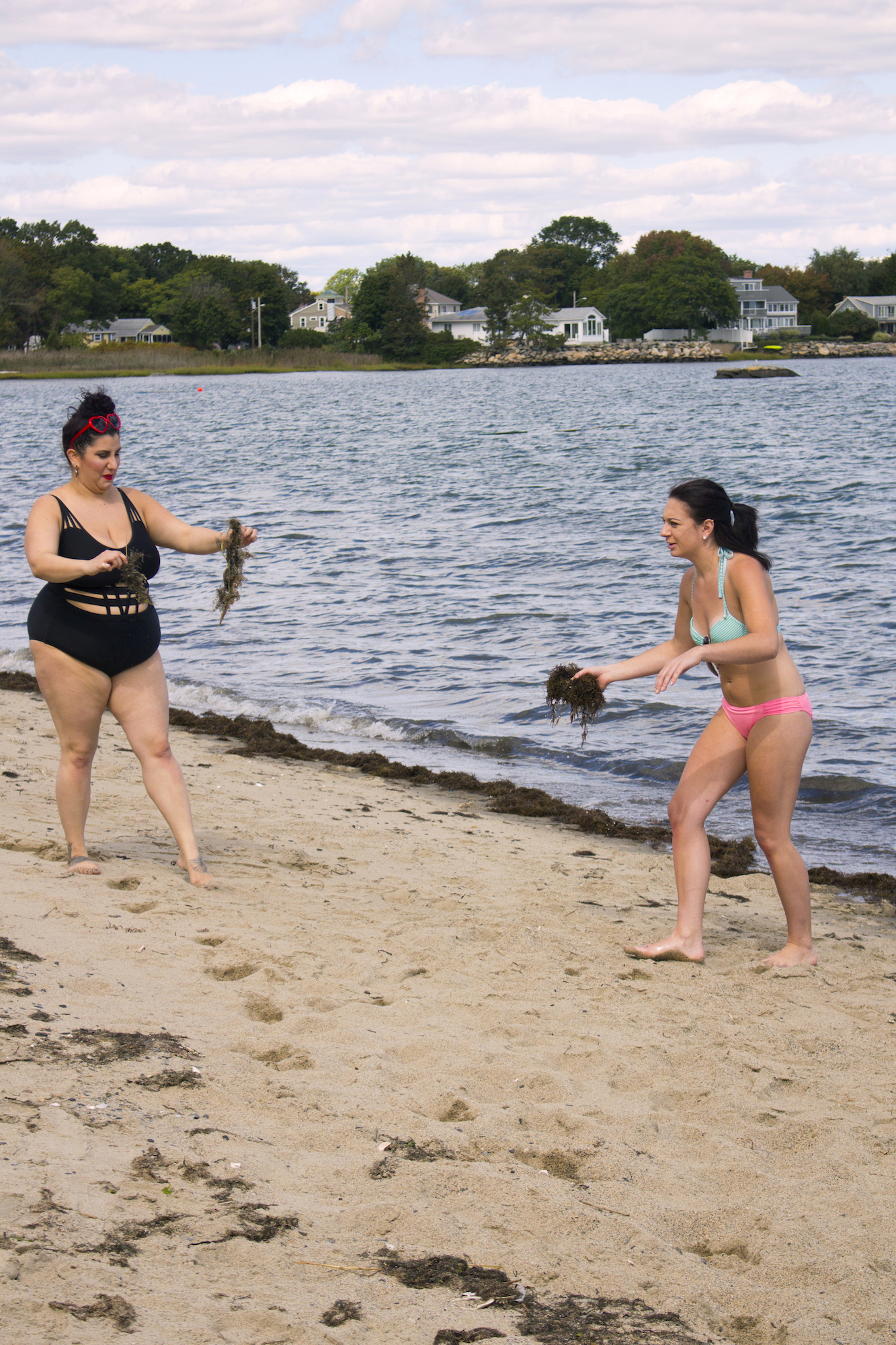 Actors Alessandra Grima and Catalina Snape collect seaweed with which to "pamper" Geena Matuson on the set of her production for comedic 'beach ads,' part of her 'Fauxmercials' series filming through 2017.