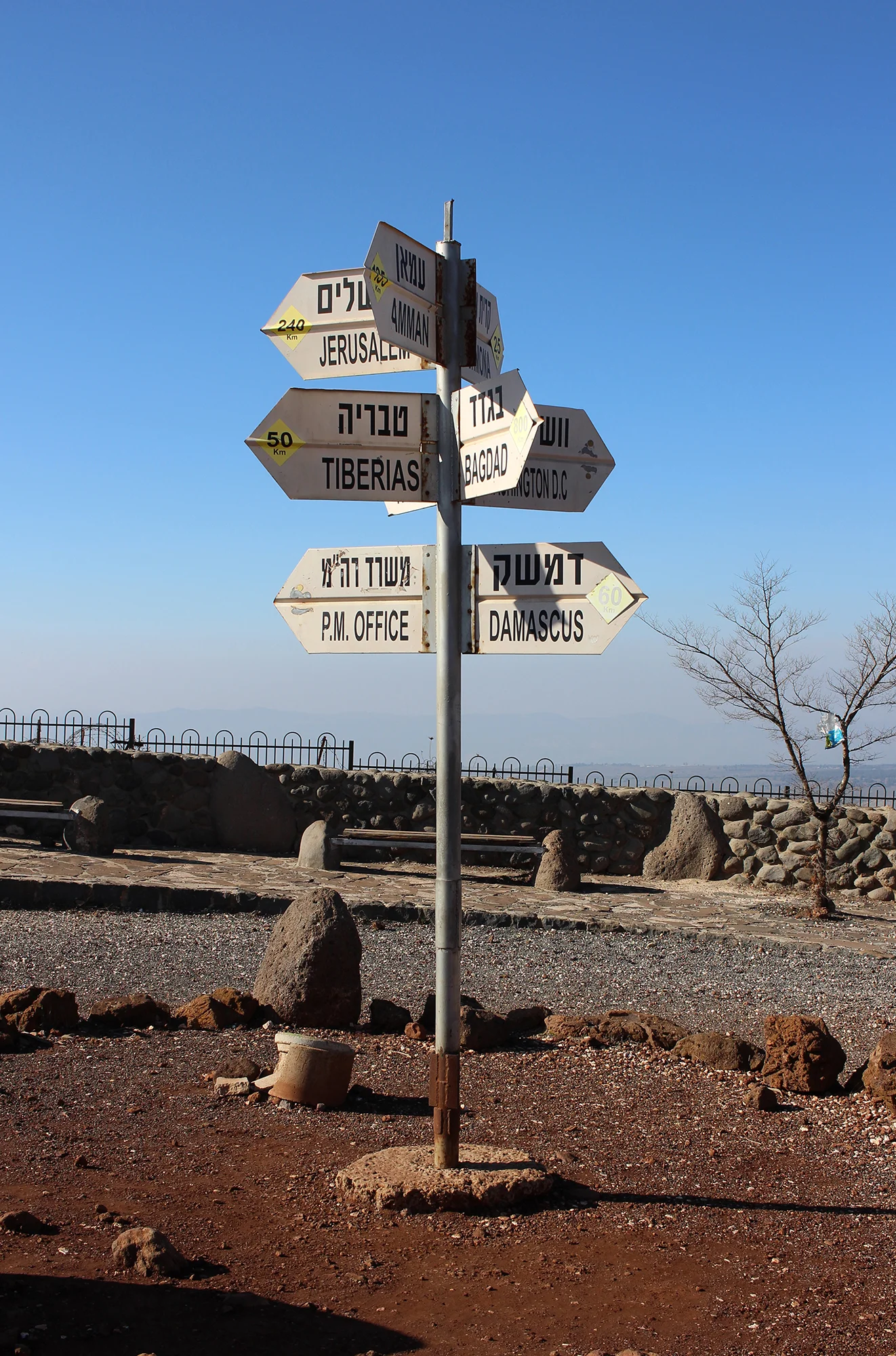 A sign at Har Bental, highest point in Golan, points to a variety of destinations. View across Gamla in Golan Heights, Israel. Travel photography by Geena Matuson @geenamatuson #thegirlmirage.
