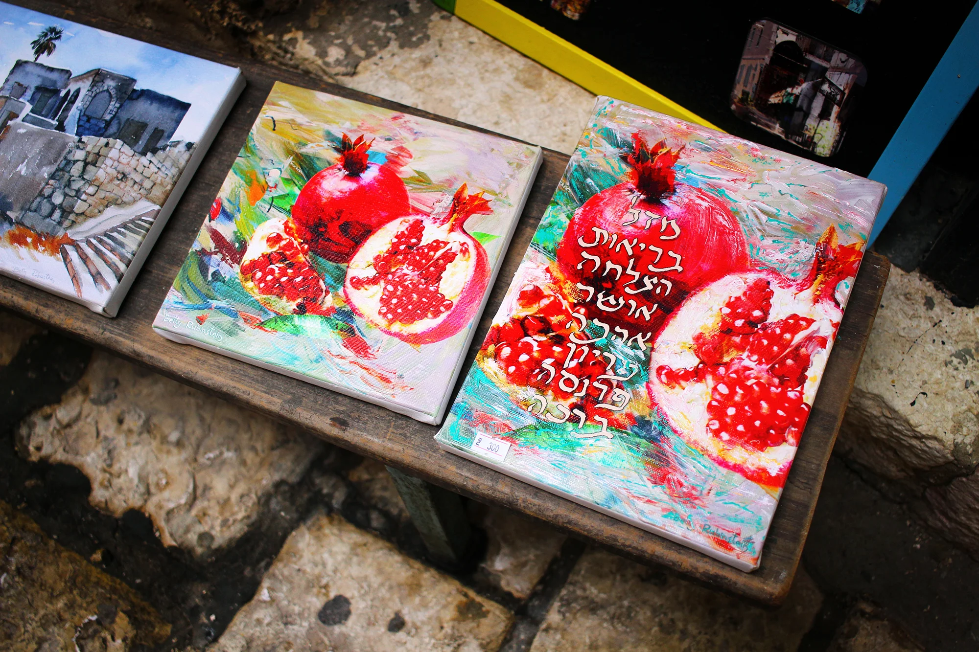 Paintings by Betty Rubinstein outside her gallery in Old Jaffa, Tel-Aviv, Israel. Photography by Geena Matuson @geenamatuson #thegirlmirage.