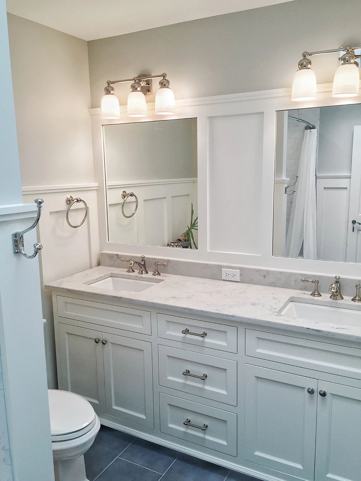 traditional inset cabinet bathroom with wainscoting by Hawthorn Development, Hawthorn Woods, IL