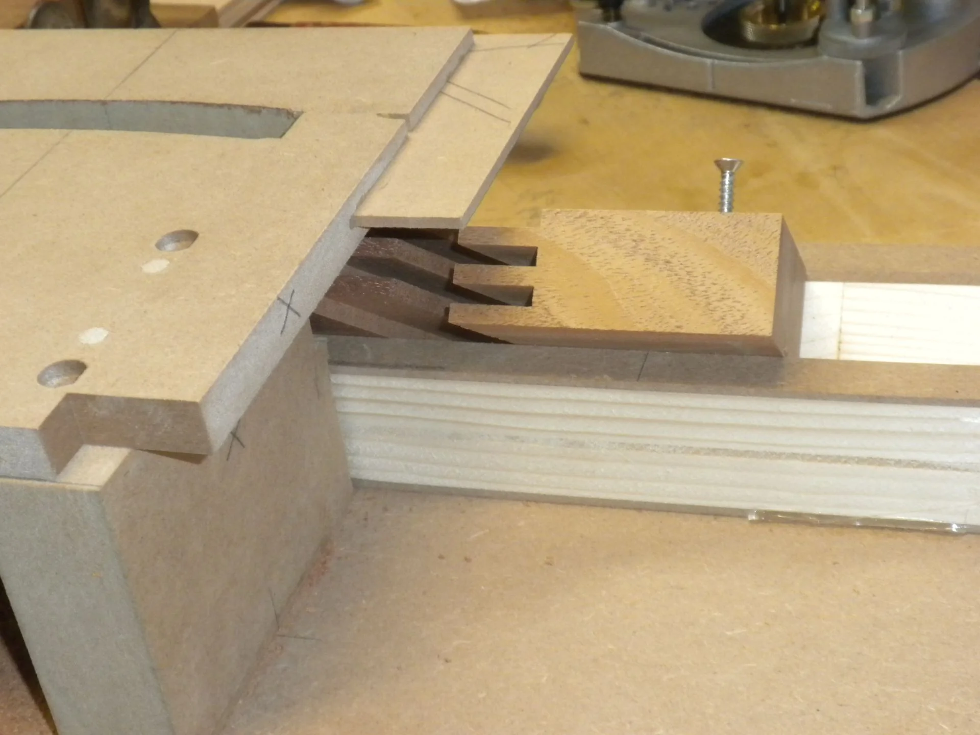   The piece is held tight with opposing finger joint stock.     