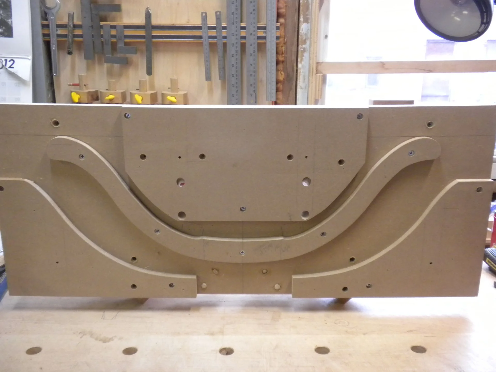  Crest rail template for overhead pin router.  