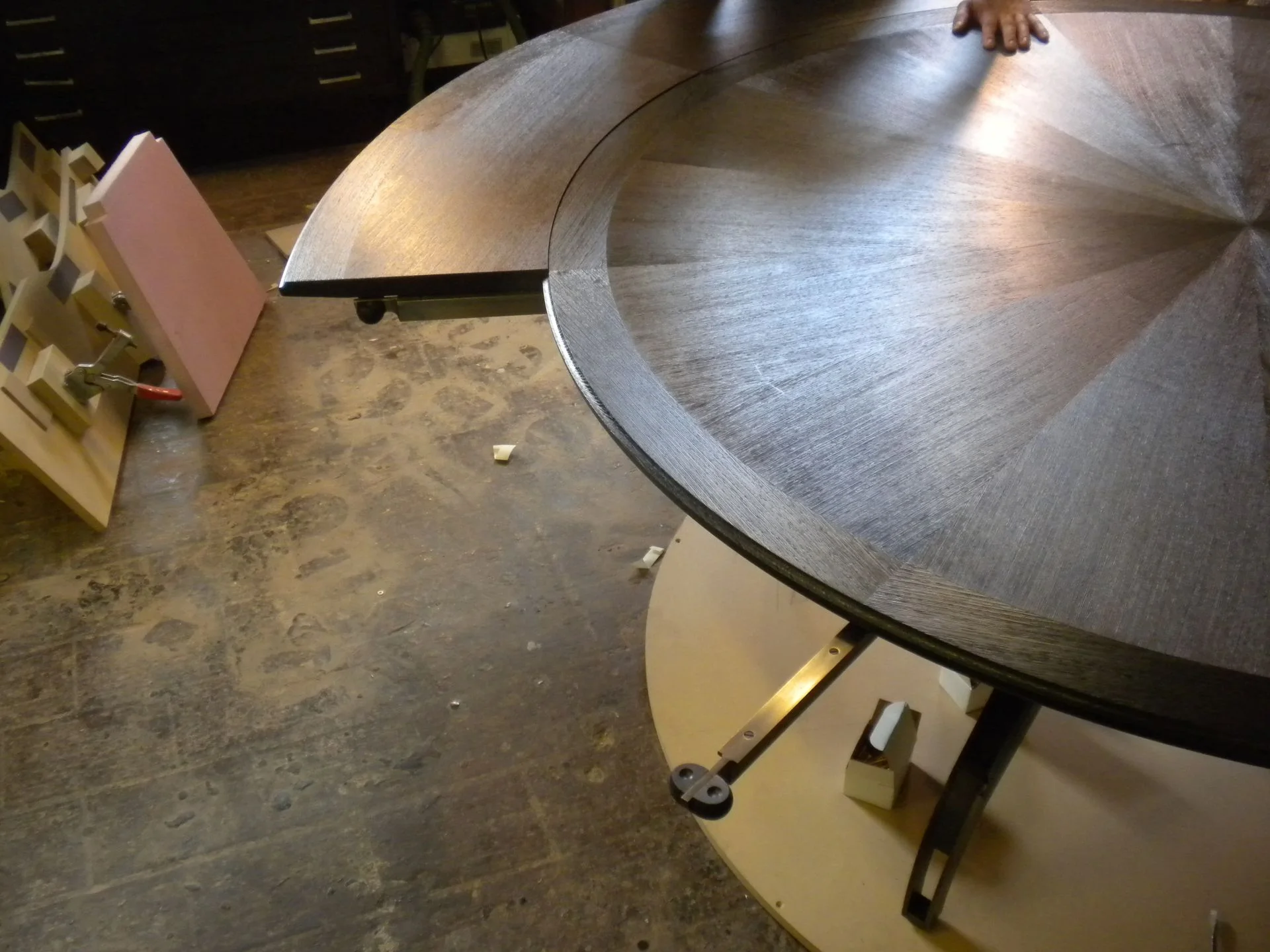  Here we see how the leaves are located around the table on the brass arms.    