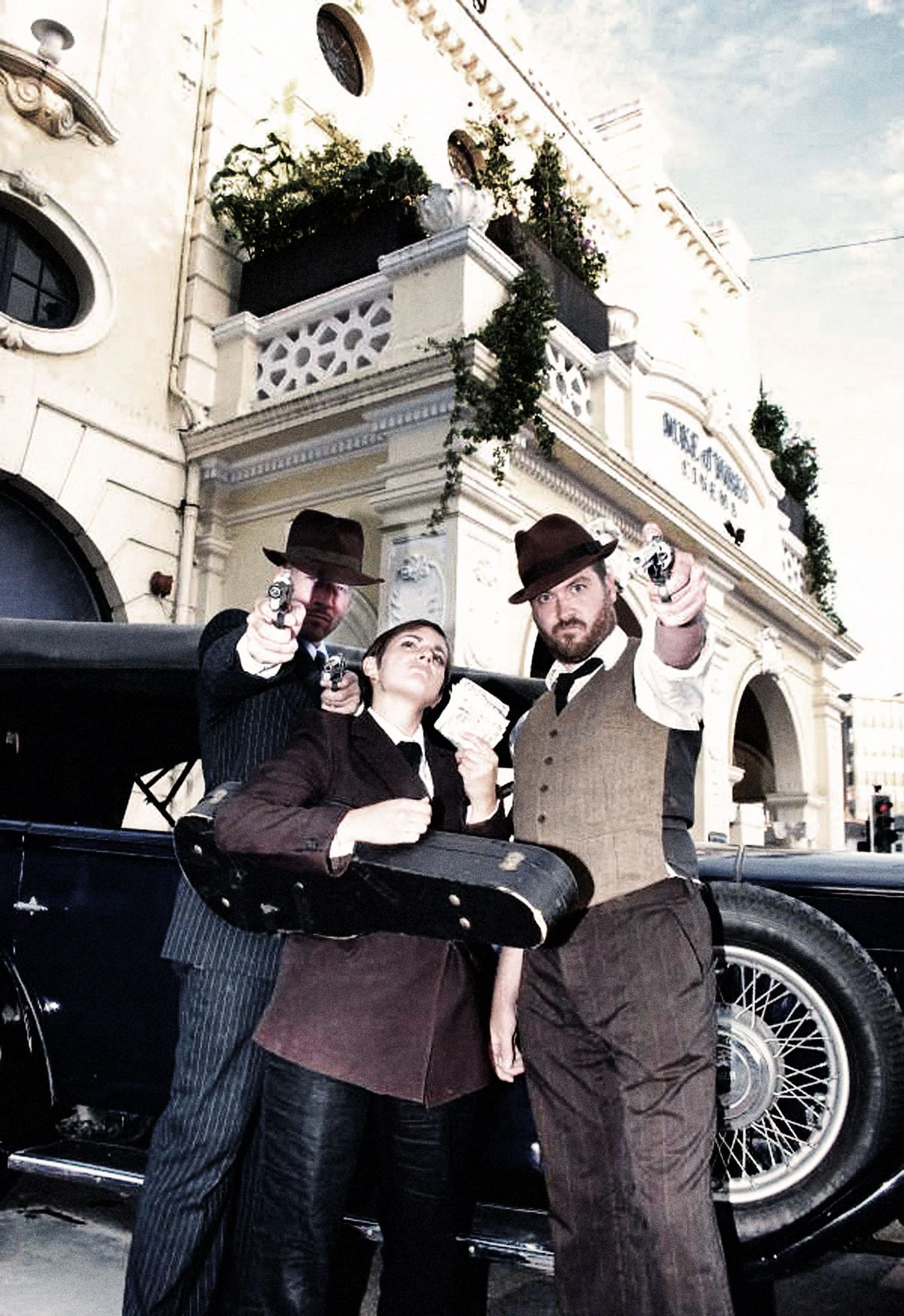 The mob and the scene of their soon-to-be disastrous heist, featuring performers, left-to-right, Liability Eden, Annie Brooks & Ulysses Black.. 