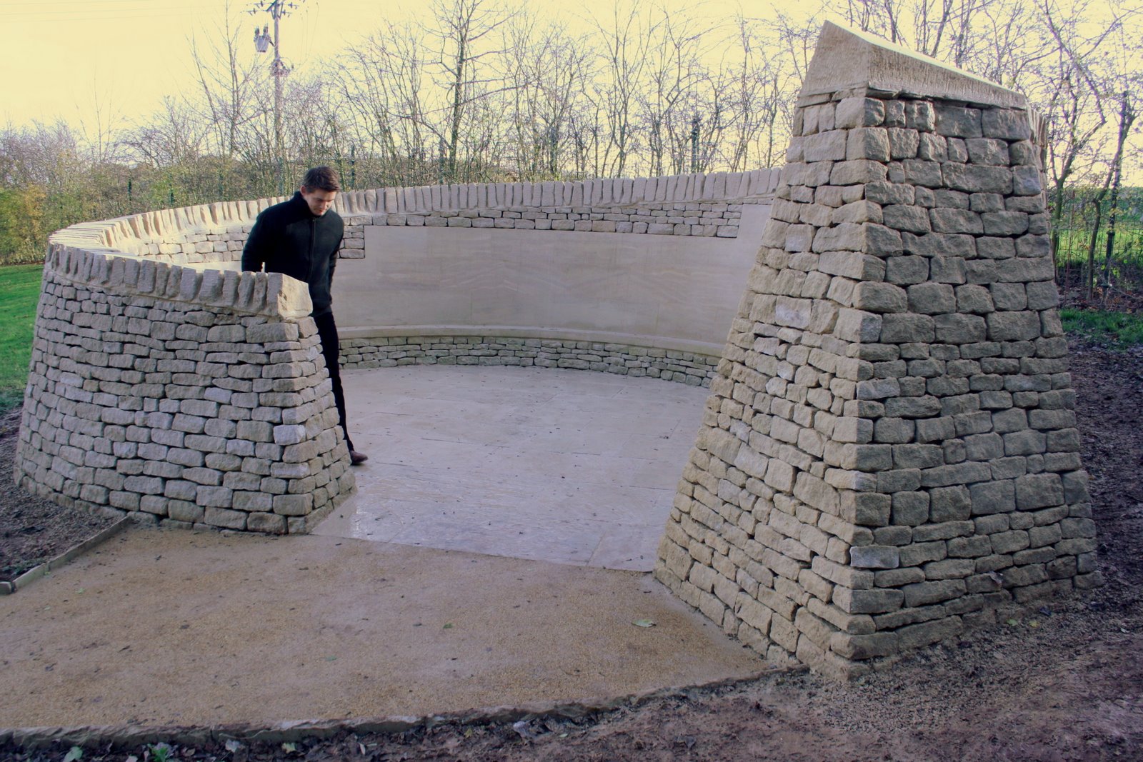 The completed stome memorial, with collaborating artist Igor Barteczko