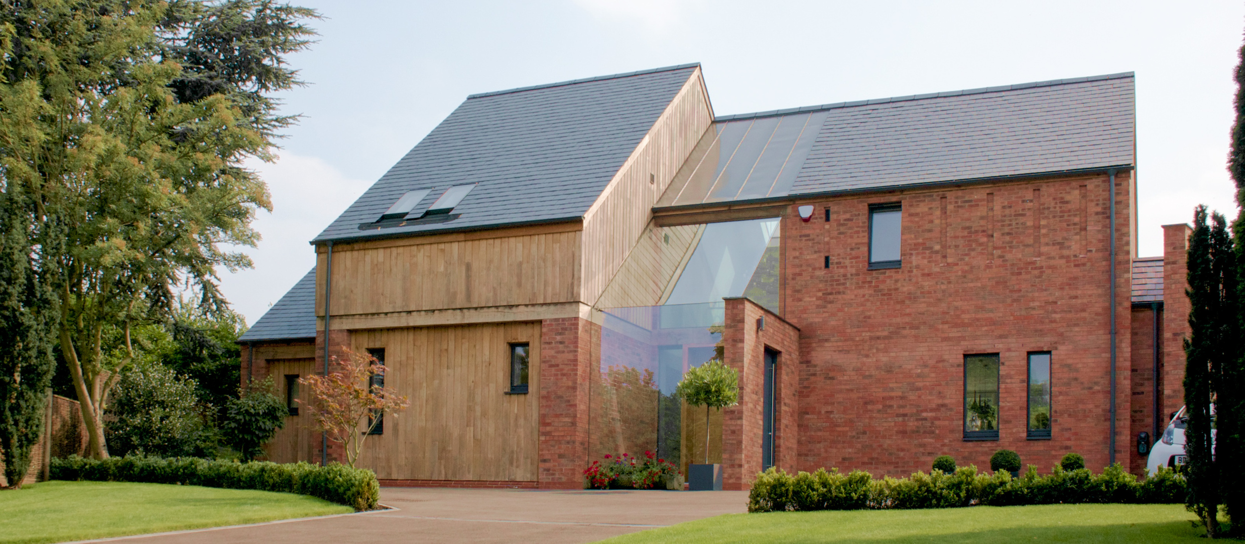 The North facade and street front, a contemporary response to the surrounding buildings of the Conservation Area.