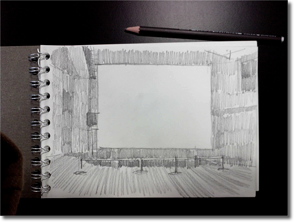 A pencil sketch in the darkness of the projection room, in which I tried to distinguish between shades of darkness around the screen and then capture that.