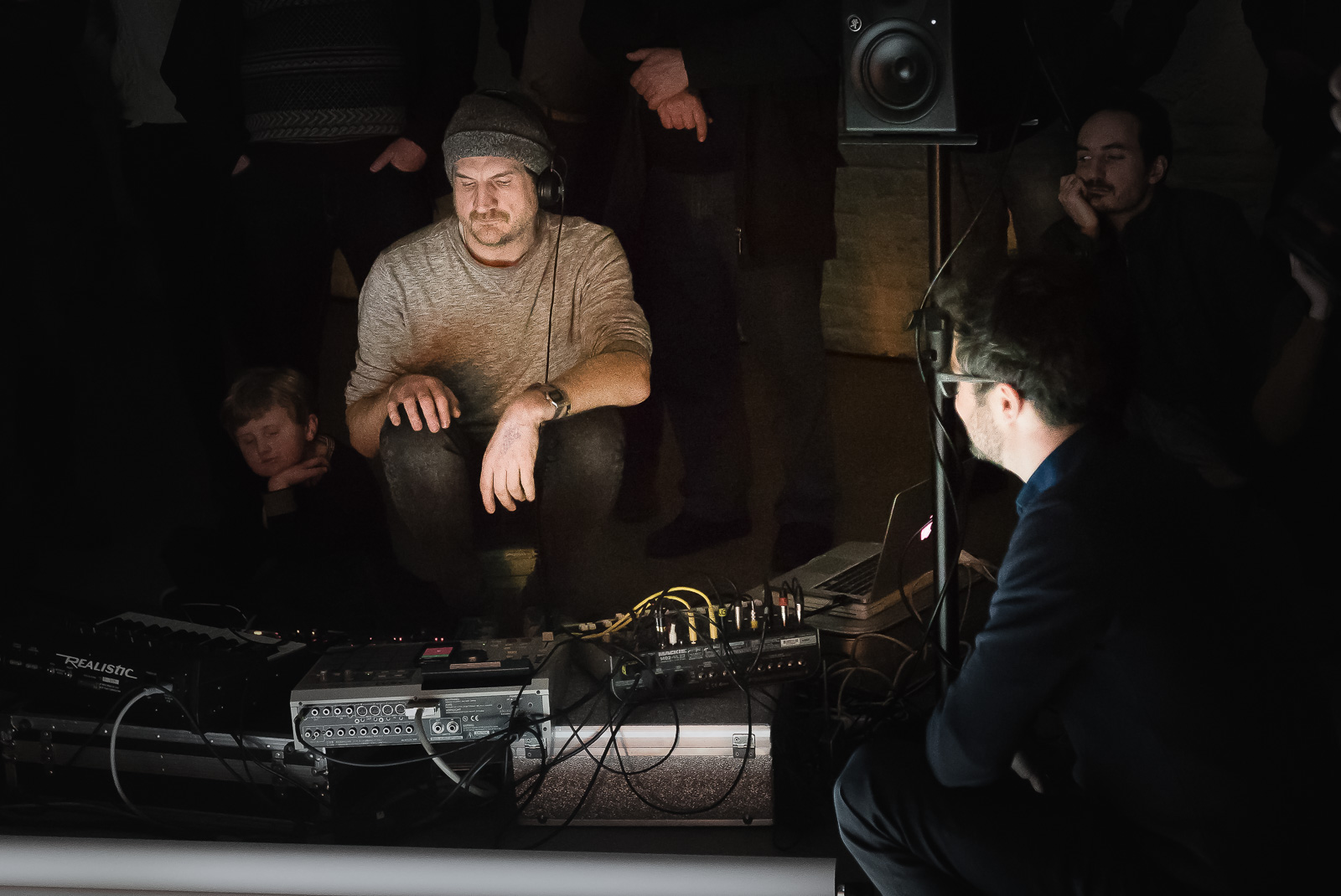 Musician Olivier Durteste (left) composing a live soundscape, as I (right) recompose the digital collage projected on the paper canvas in front of him.