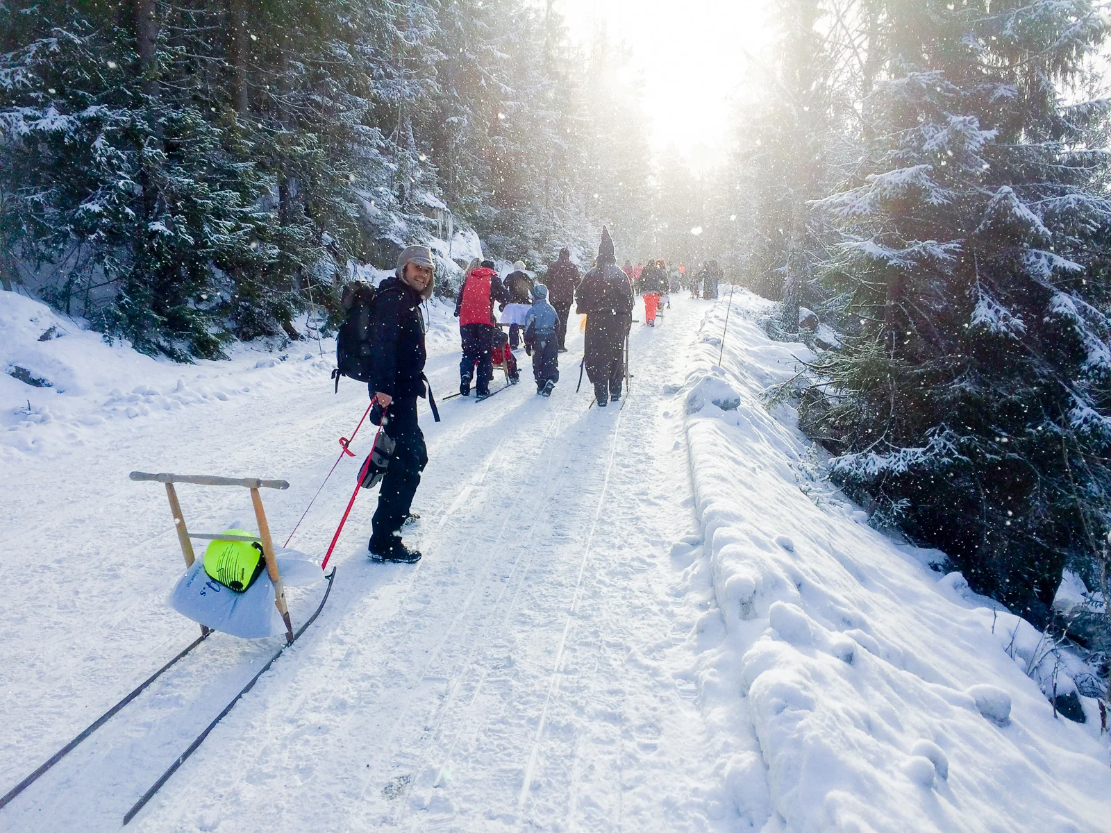 Hauling our finely tuned Spark up the mountain to the start line. Sun, snow and men dressed as wizards.