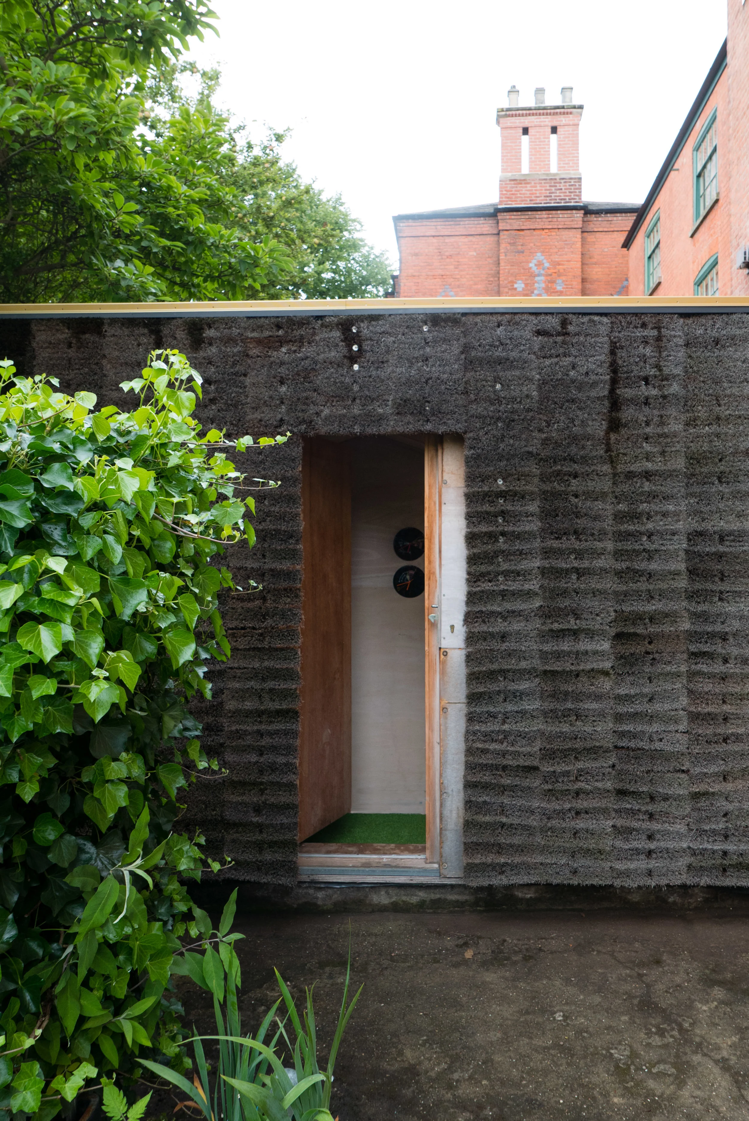 The boom cladding, momentarily shifted to reveal the space within