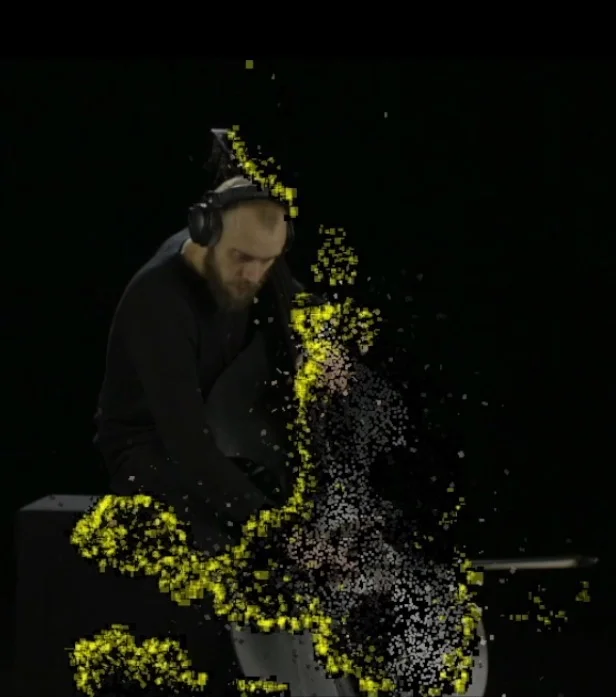 Prototype of live visual effects, projected over double-bass player Nicolas Crosse, through the black open weave screens