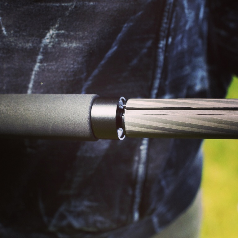 Screw the tripod leg into the center colum.