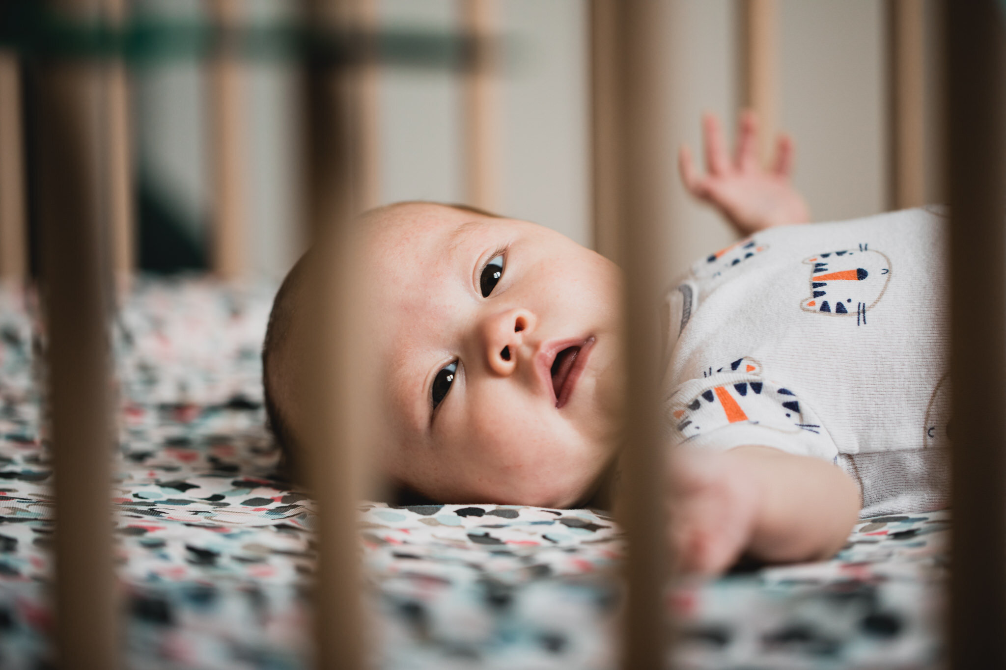 Baby in her own crib, Family session