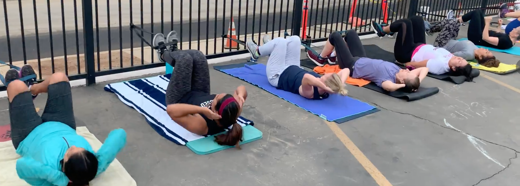 Morning Clients Getting in Some Reverse Band Crunches