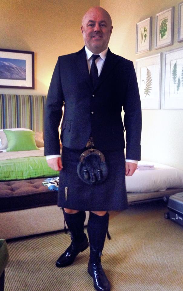 Scott Rodger, who manages Sir Paul McCartney, Arcade Fire and many other artists, in his first kilt suit. The kilt and jacket details were in a stealth tartan that only reveals when the light hits at a certain angle. The silver skull on black glass buttons were commissioned exclusively from Stuart Goodings at www.militaryjewellery.com