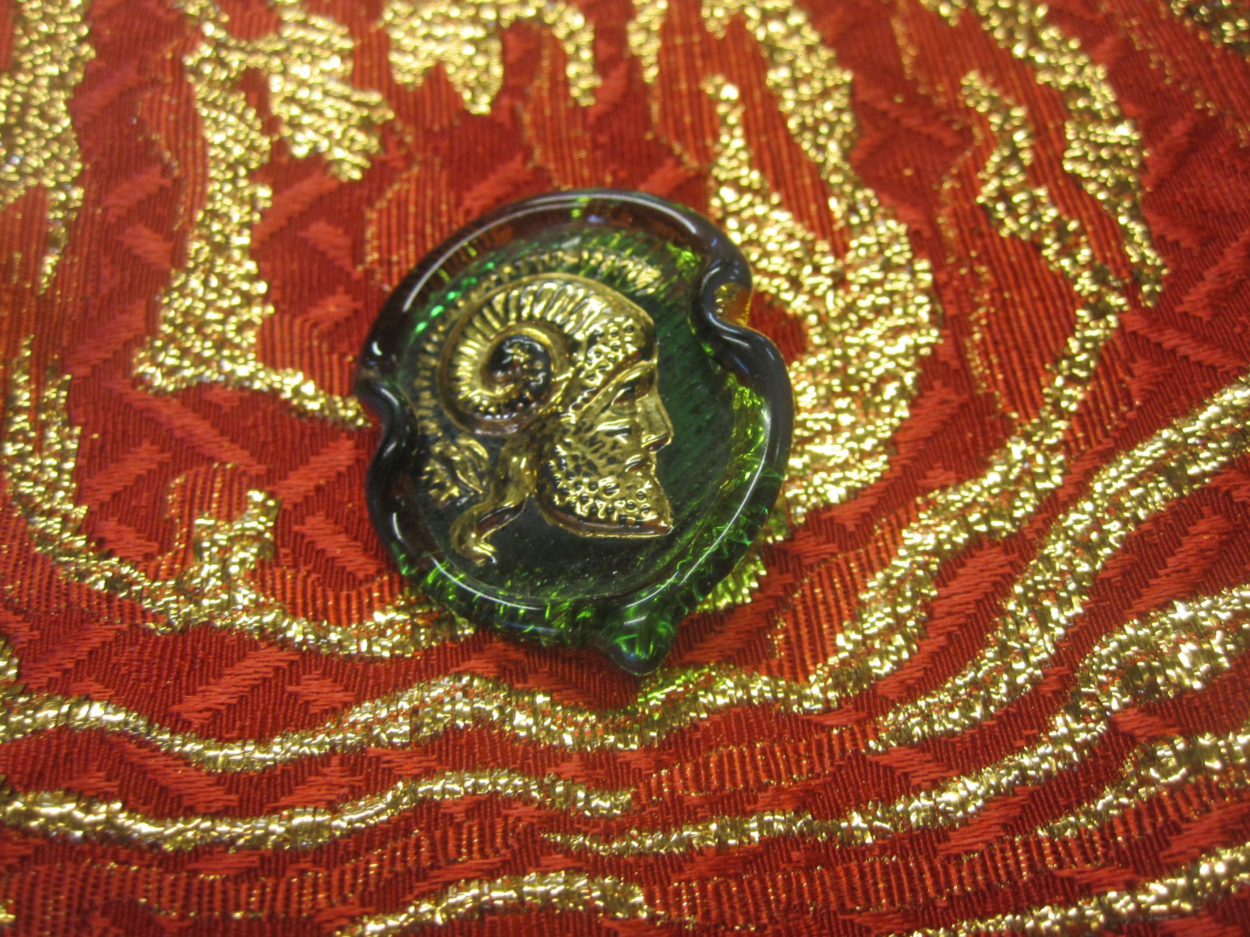 Vintage glass buttons with gilt satyr head from my grandma's button box, a nod to Arthur's family's coat of arms.