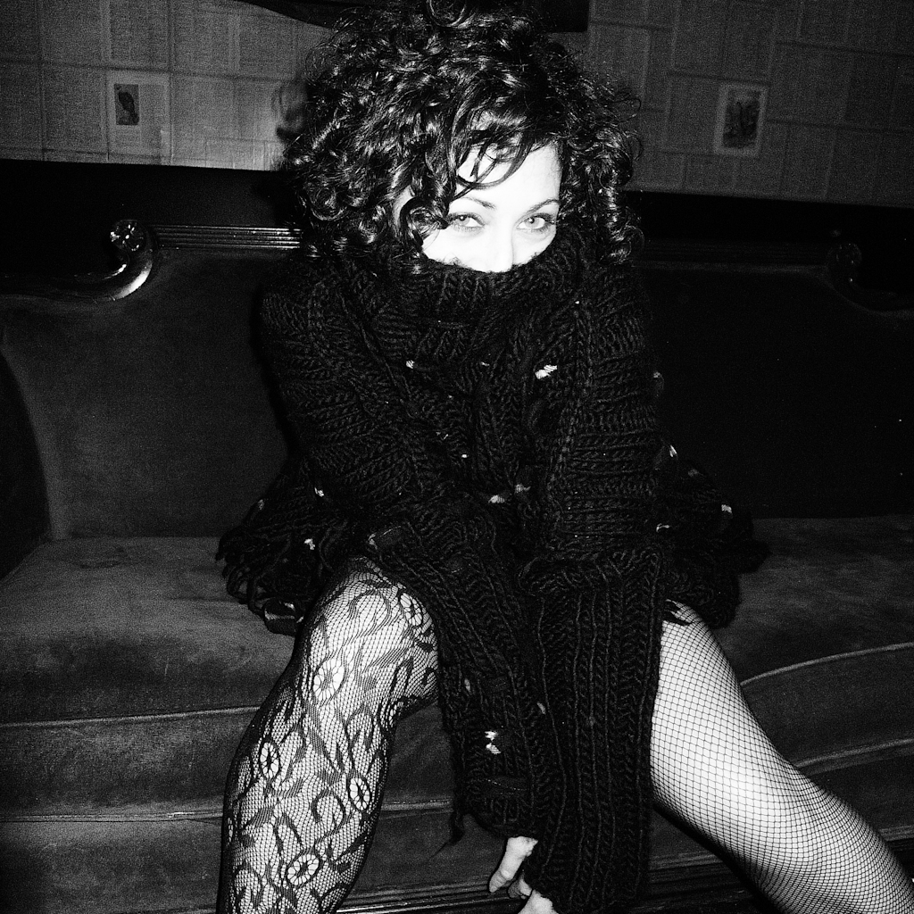 Lady of letters, acclaimed author and beauty, Michele Jaffe, modelling the "Rasta" jumper at the Bedlam Bar in New York City.