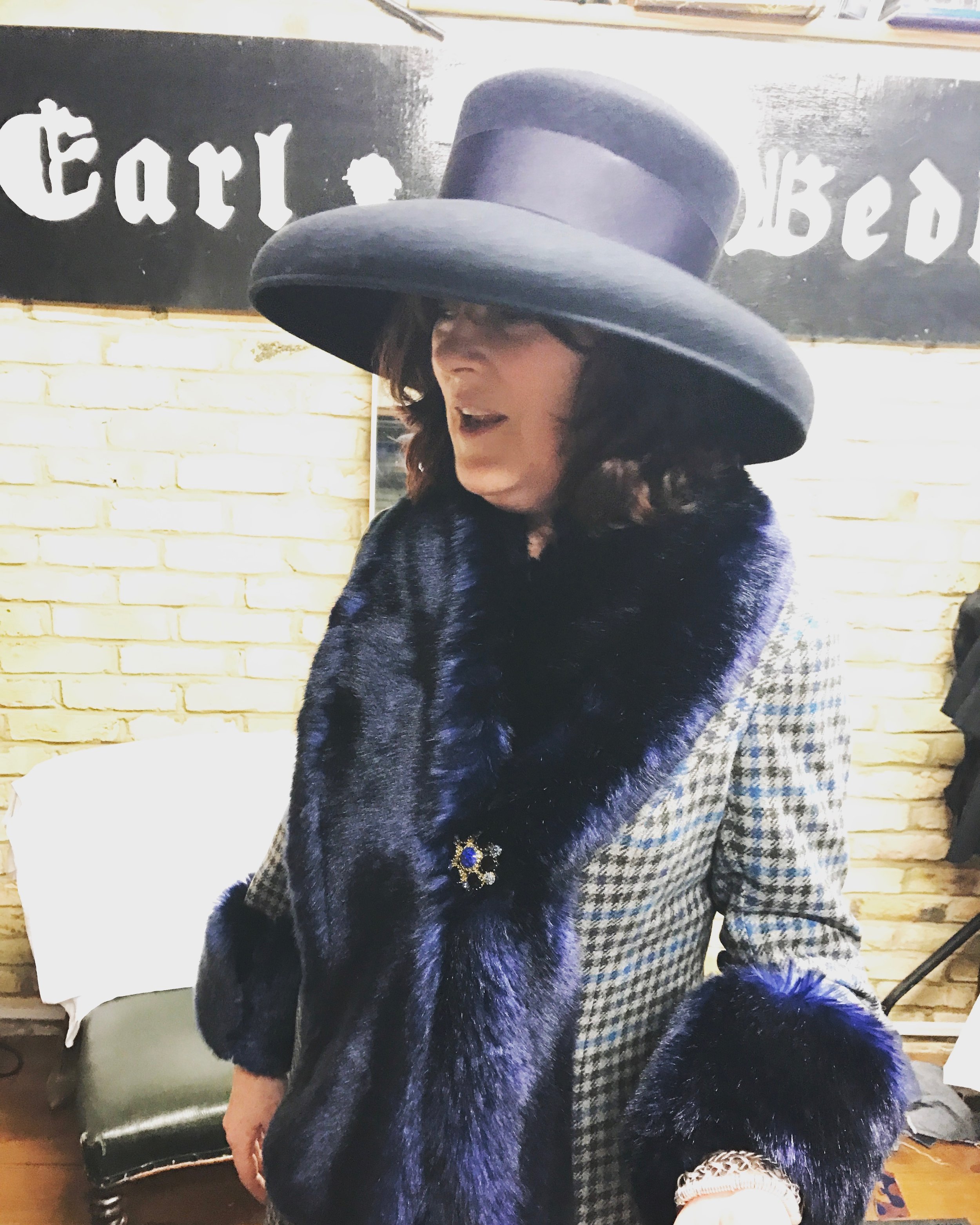 Kirsty, Bedlam's milliner, made her wide brimmed hat.