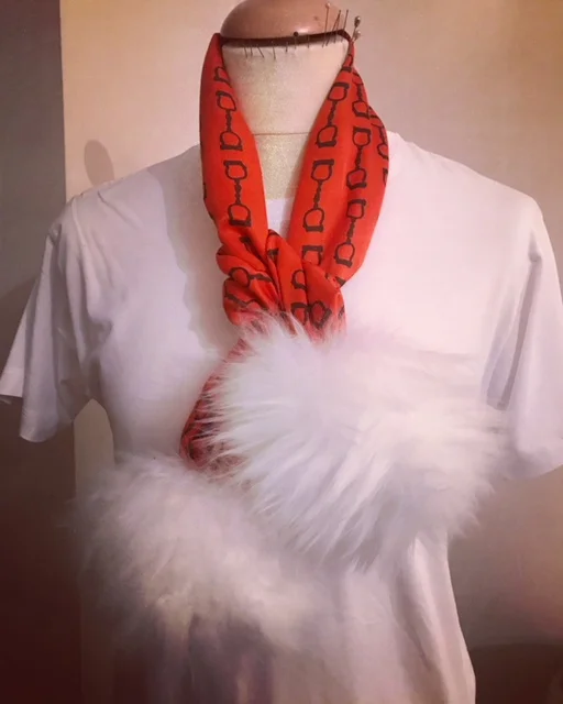 The snowball scarf - sheepskin pompoms attached to our signature handcuff silk