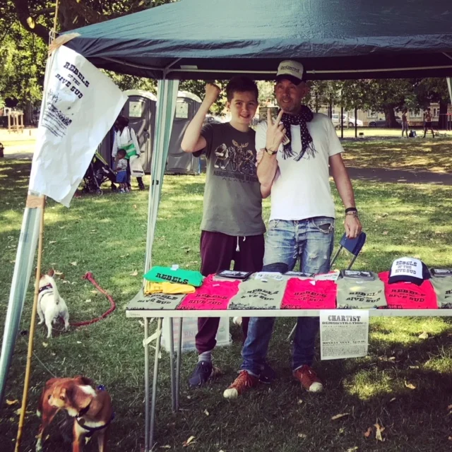  Ocean and Mr Wesley man our stall in Kennington park to celebrate the gathering their of the Chartists who won the vote for the common man (hitherto lumped with criminals and the insane as unfit to vote). A fairs days’ wages for a fair day’s work wa