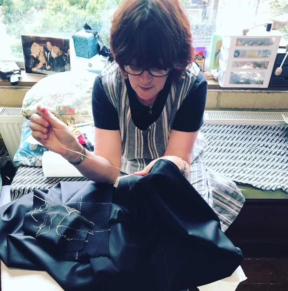  Kate was a student at the Royal School of Needlework when she embroidered the gold silk lattice across Nile’s jacket front. The “imperfect” brief was a challenge for her but it had to be that way as only Lucky Gods can achieve perfection. 