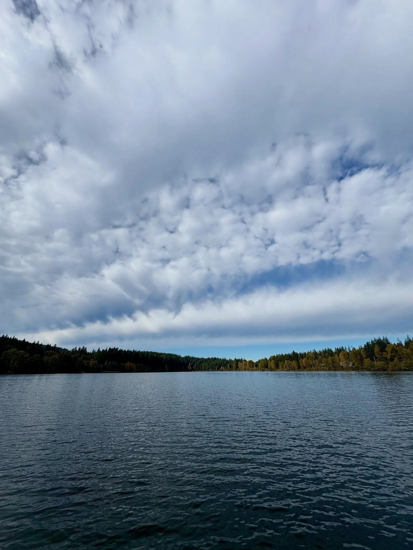 Cloud streets as long rows of puffy cumulus or cumulus-type clouds. They are most often straight, but might form patterns when the wind driving the clouds hits an obstacle. Cloud streets are formed by what are called convection rolls of rising warm a